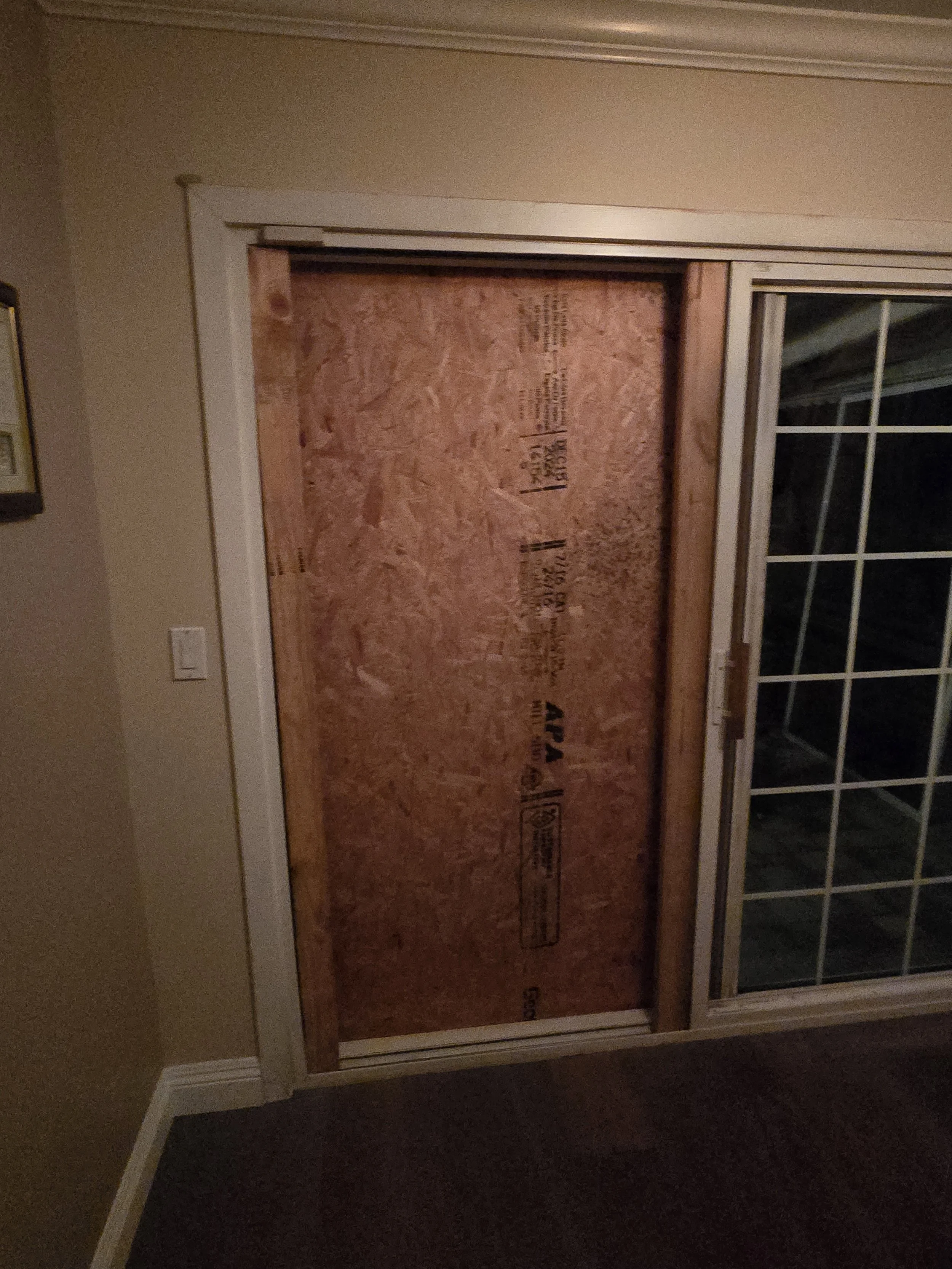 Emergency board up completed on a residential sliding glass door