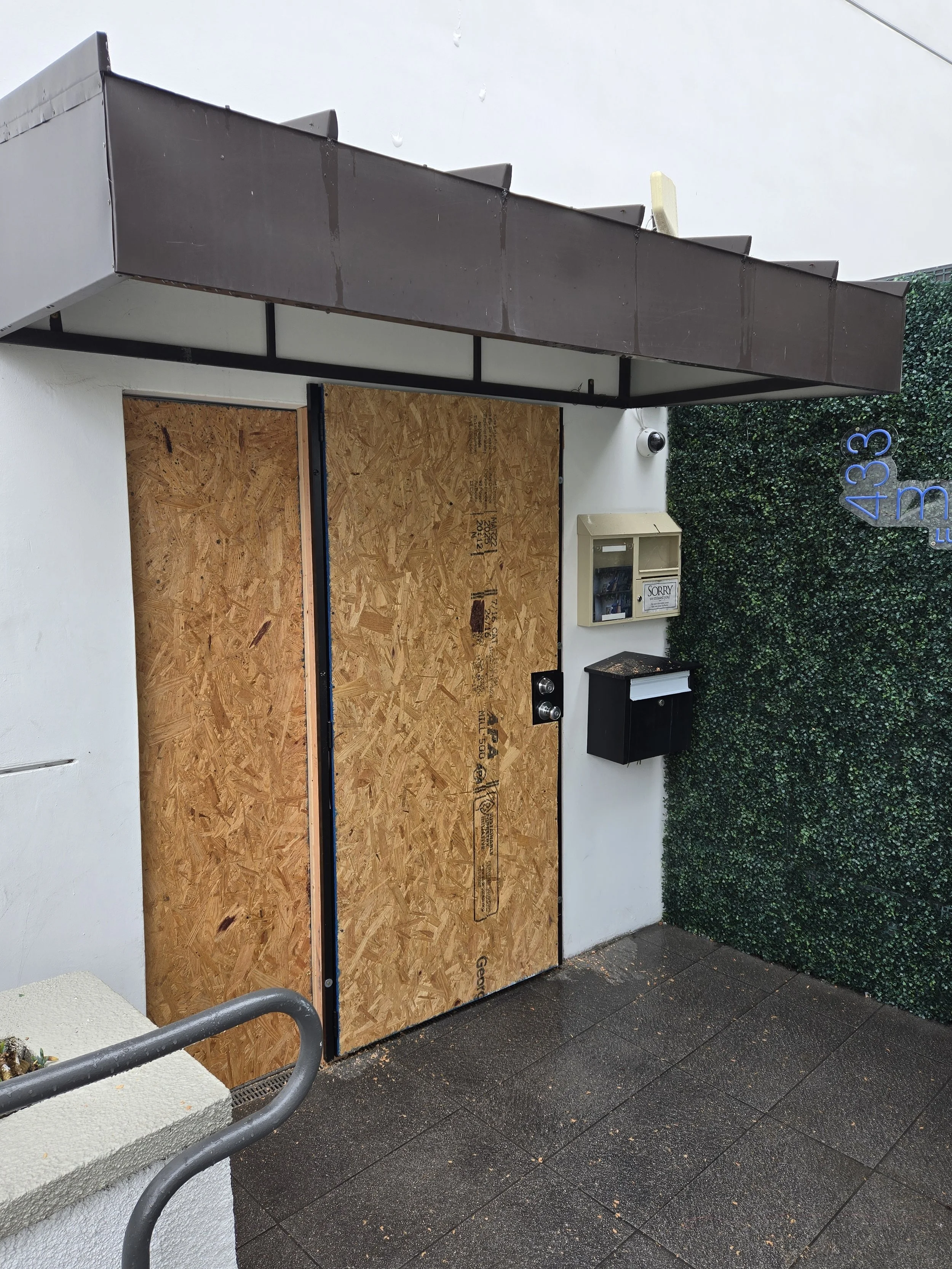 Custom security door installation in Los Angeles — solid plywood 
doors built and installed by Boardup LA for long-term property 
protection beyond emergency board-up.