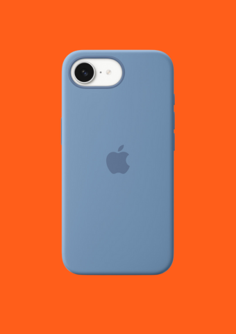 A blue Apple iPhone with a camera on the top left, resting on an orange background.