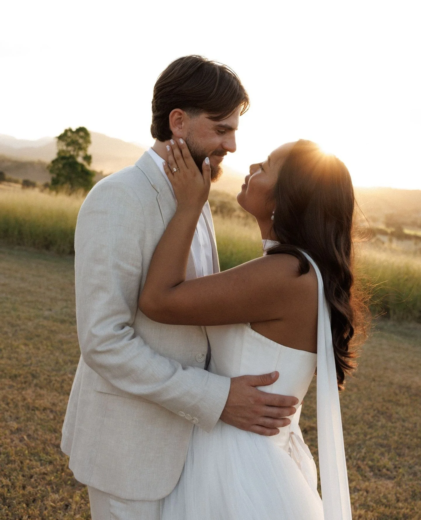 Sarah &amp; Hamish didn't need direction. They just needed each other, and from there, the evening wrote its own story. 🕊️⁠
⁠
The light fell soft and golden across the field. They pulled each other close and forgot, just for a moment, that there was