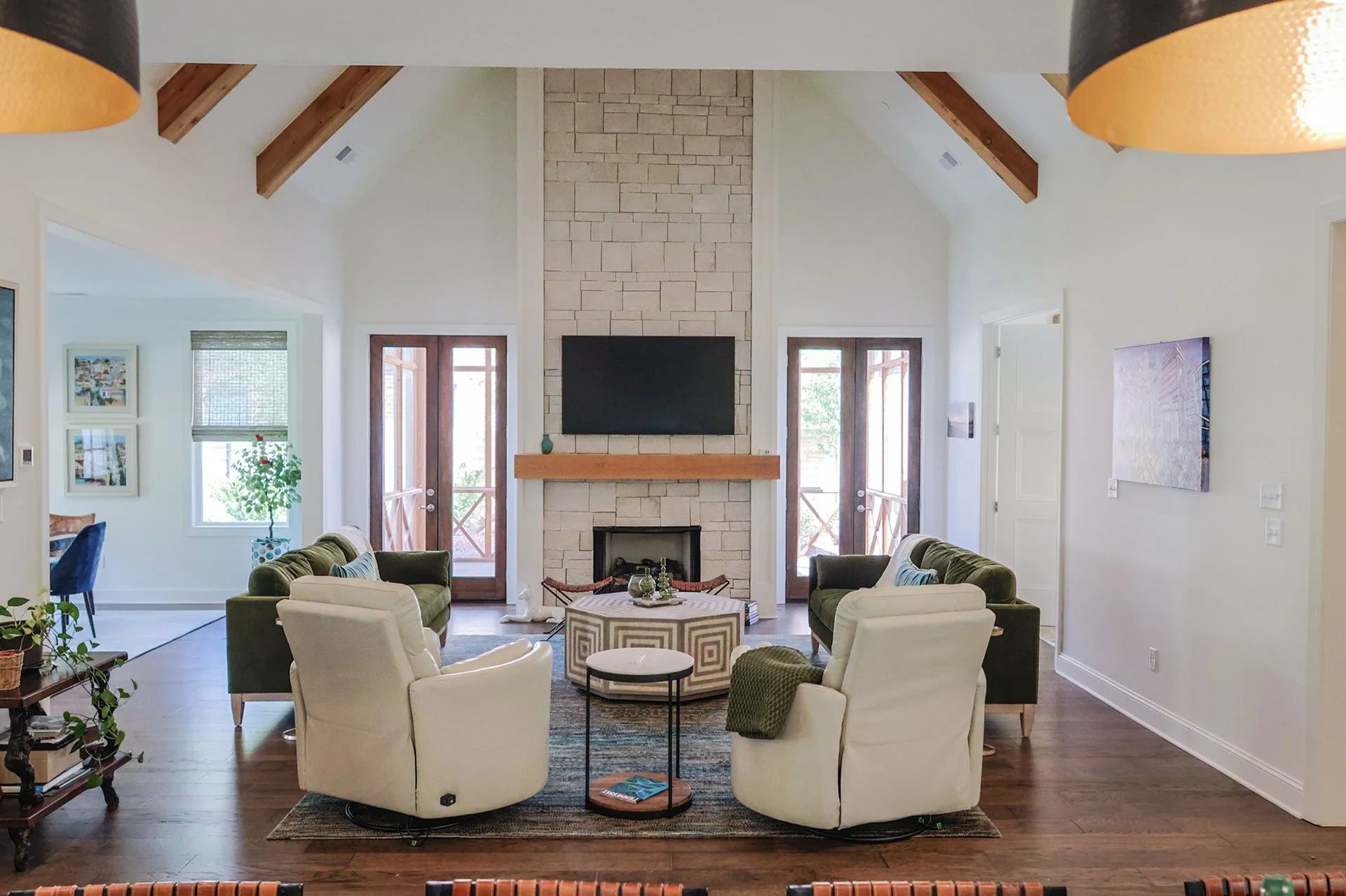 living room featuring floor to ceiling fireplace