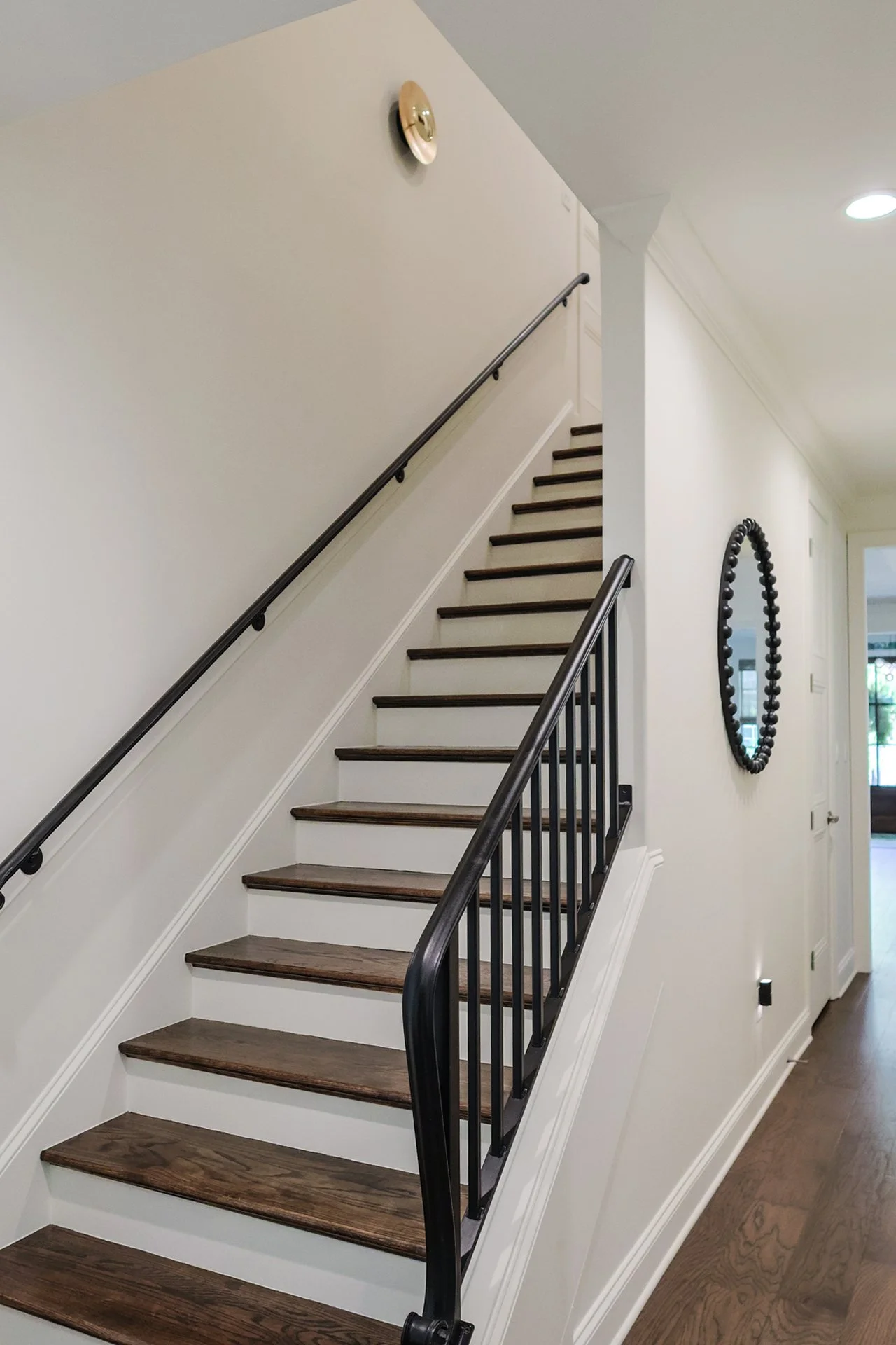 natural hardwood treaded stair case with balustrade rails 