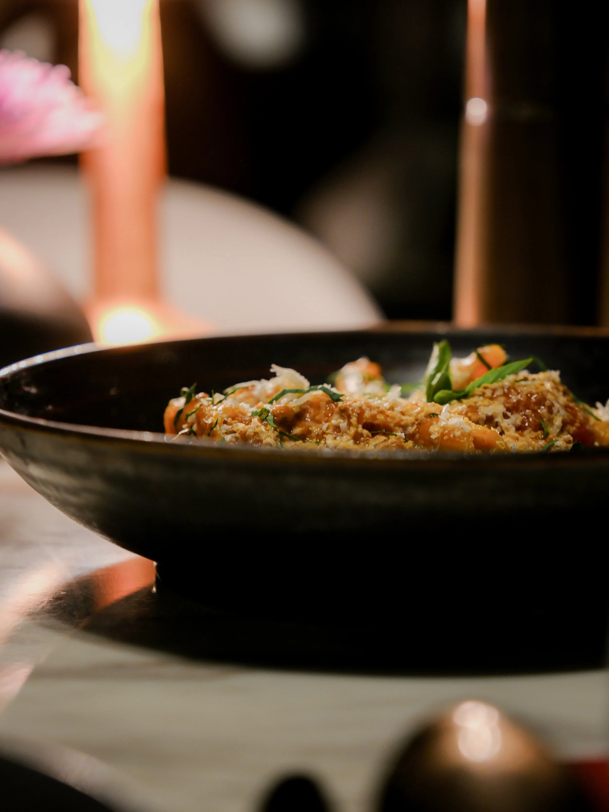 Kimpton Maa Lai Bangkok signature noodle dish close-up — luxury hotel food photography Bangkok 2026