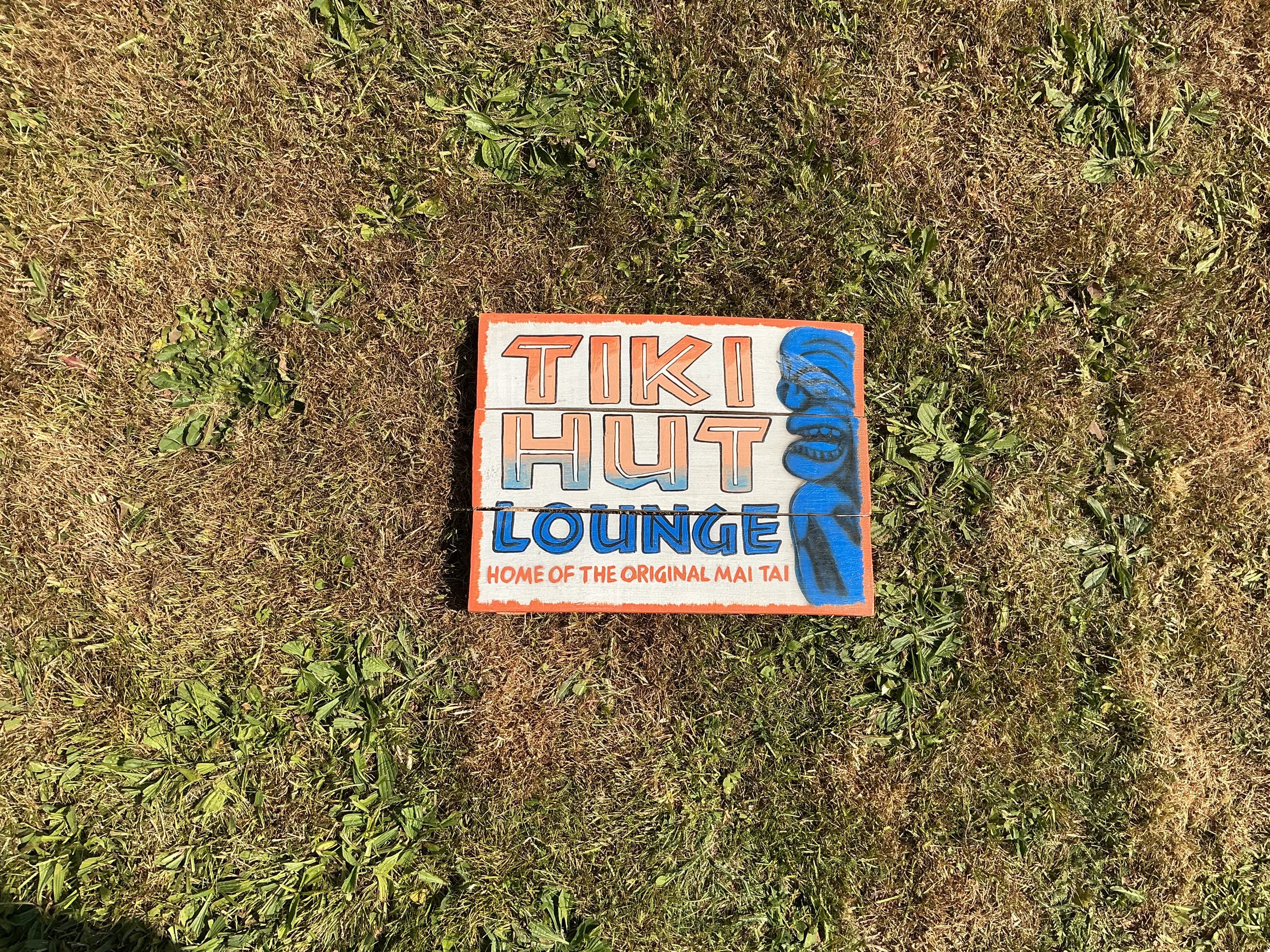 Tiki hut lounge sign
