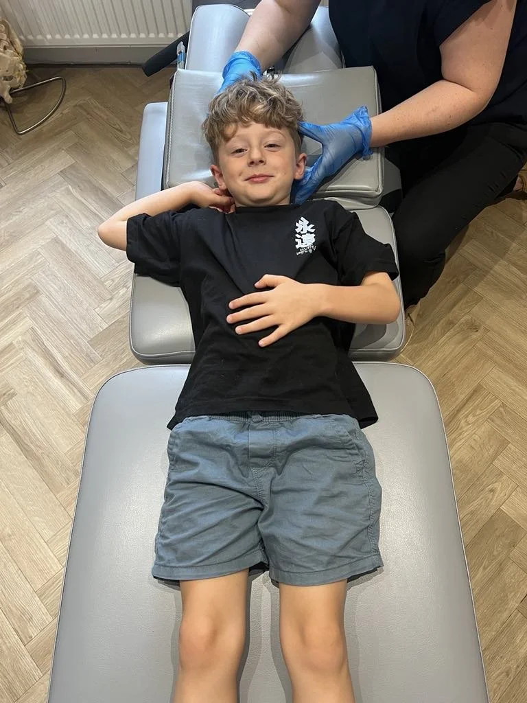 Child having Chiropractic treatment from a Chiropractor in Kettering.