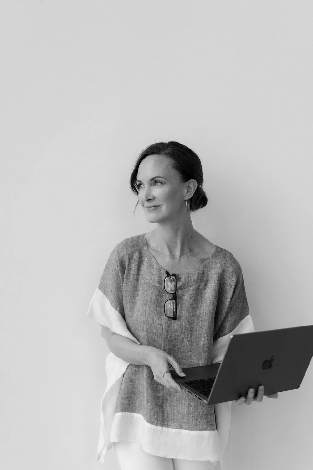 website designer holding laptop