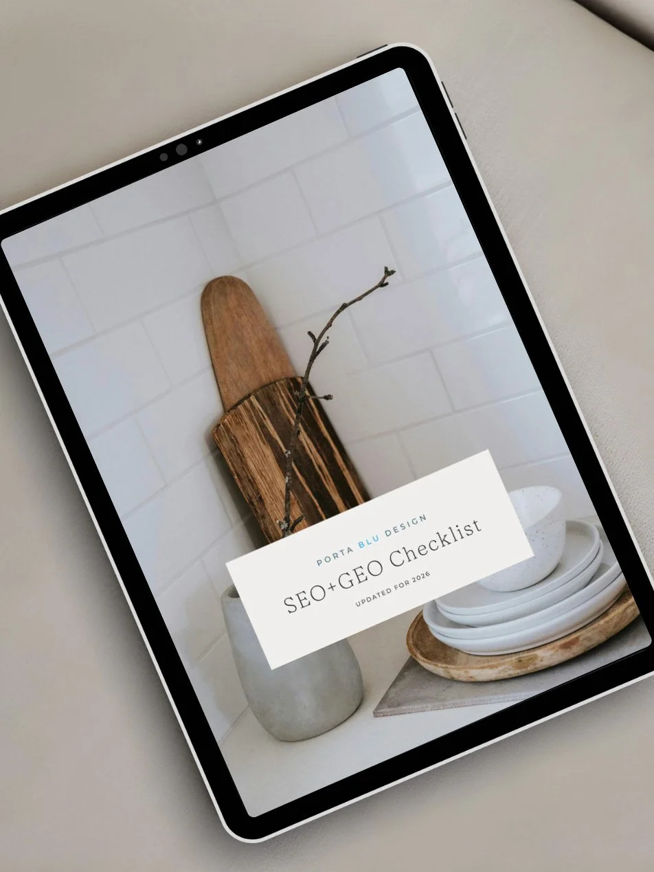 Cover page of SEO and GEO checklist guide with minimalist decor including a white tiled wall, a vase with a twig, a wooden cutting board, and stacked white plates.