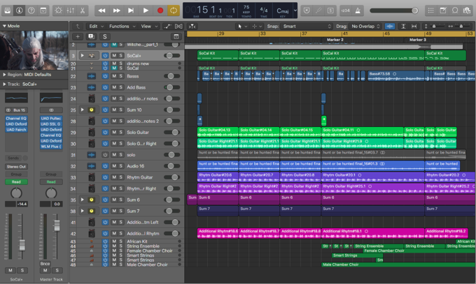 A digital music production project in a DAW interface with multiple tracks, including drums, bass, guitar, vocals, and various instruments, displayed with clips and editing tools.