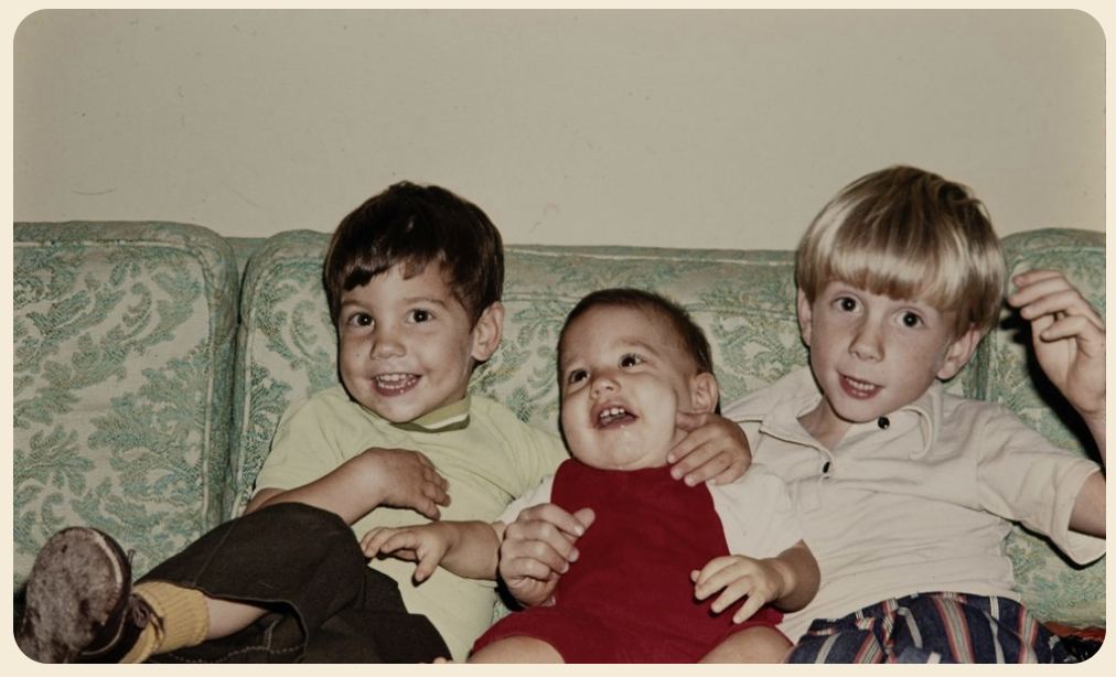 three kids on a couch
