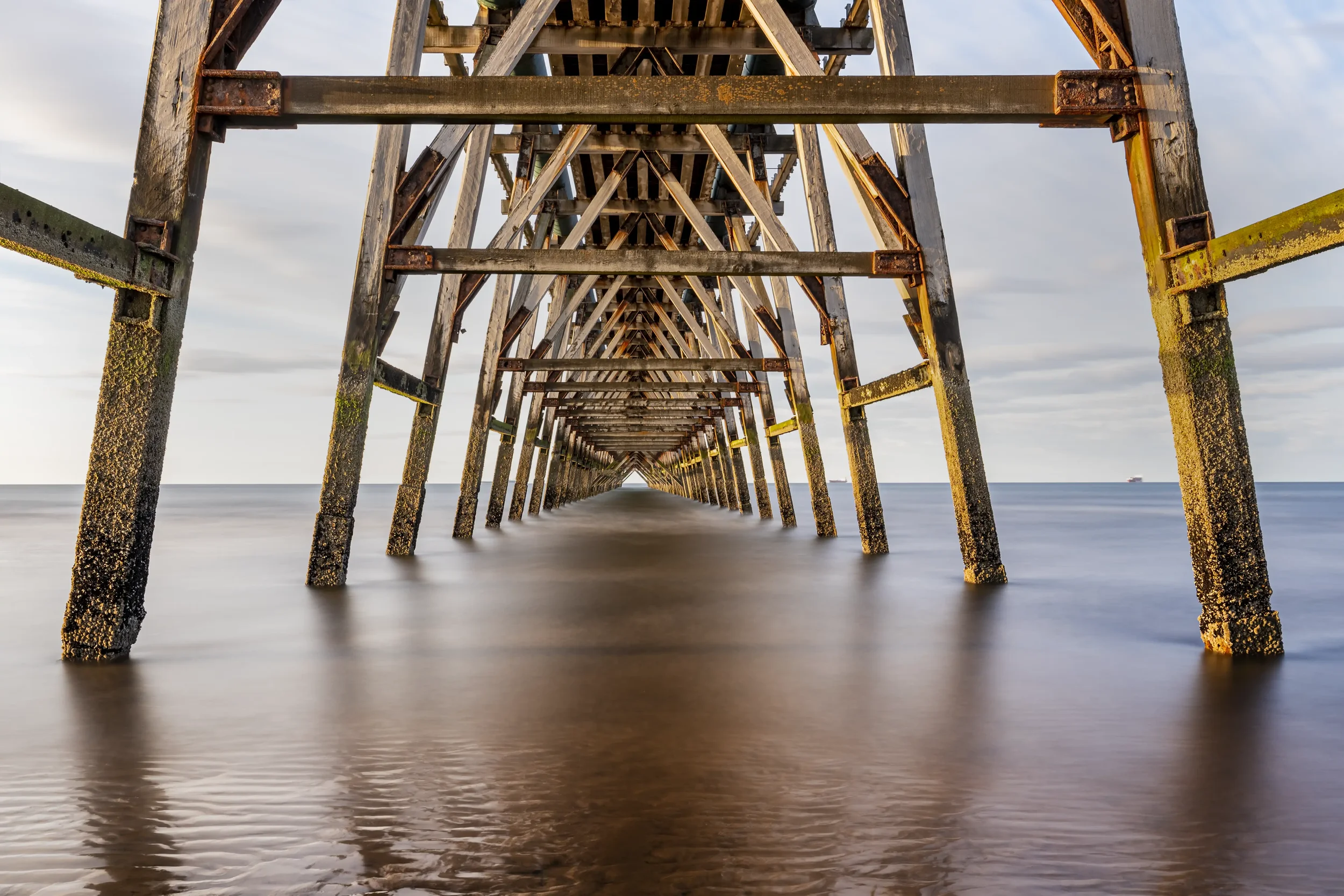 Long exposure shot of Steetley Pier, Hartlepool, taken shortly before sunset, July 2022.
