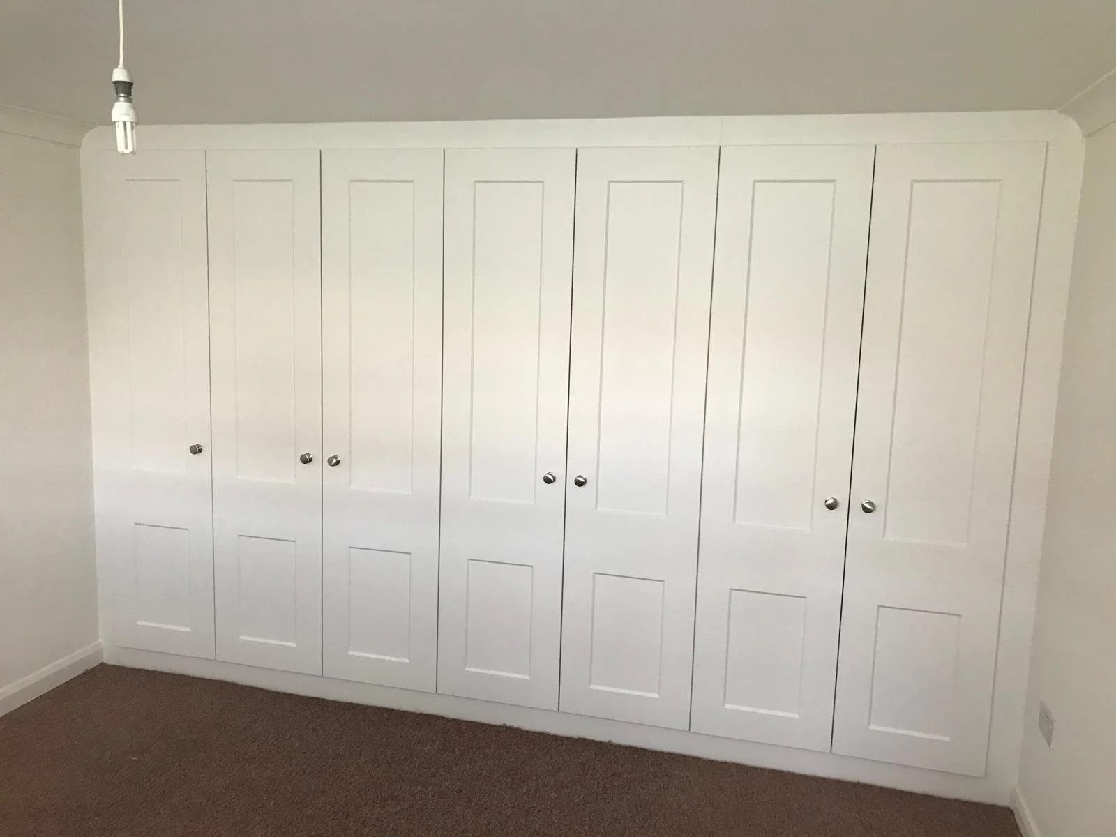 fitted wardrobes. low ceiling. fitted bedrooms. bella cambridge. selsey bill. west sussex