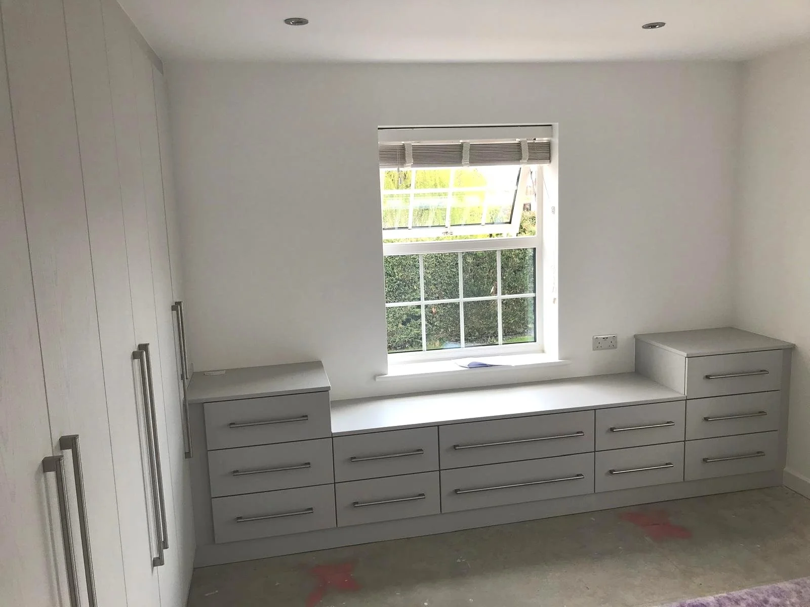 fitted wardrobes. fitted bedroom. Bella. stable door. grey. long bar handles. window seat. drawers. Bella VENICE. Petersfield. Hampshire