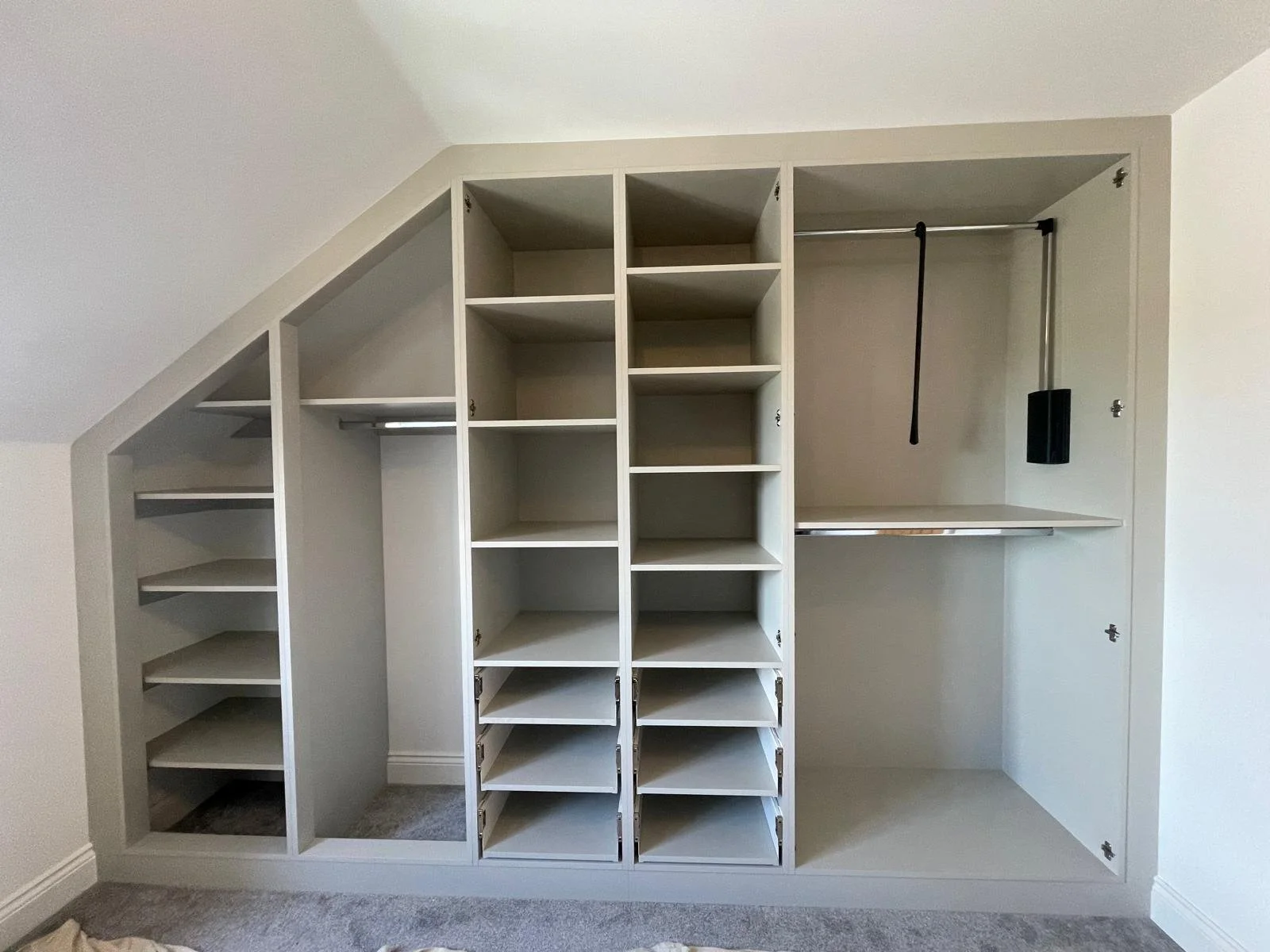 slope ceiling. made to measure. bella richmond. Taupe grey. fitted wardrobes. angle ceiling. frames. Bognor Regis. West Sussex