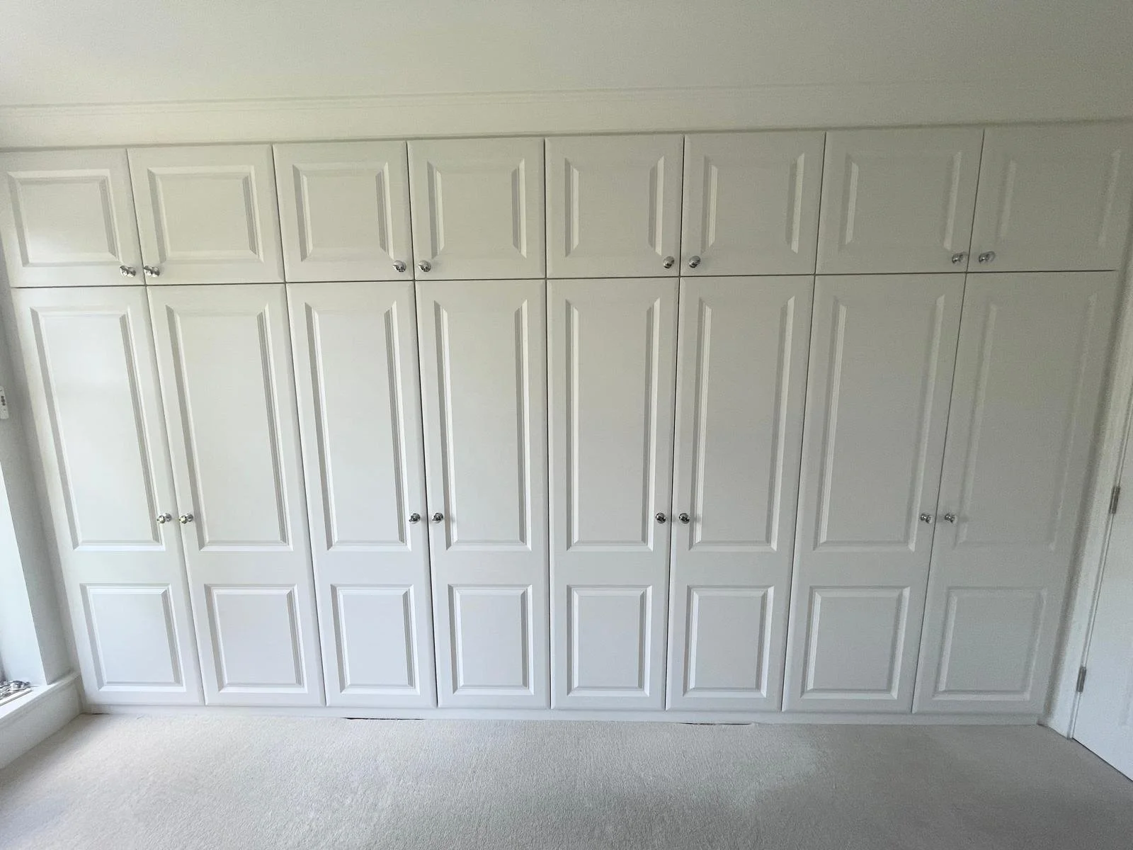 classic. fitted wardrobes. top cupboards. Bella Your. bespoke fitted wardrobes. bedroom furniture. Lavant. Chichester. West Sussex