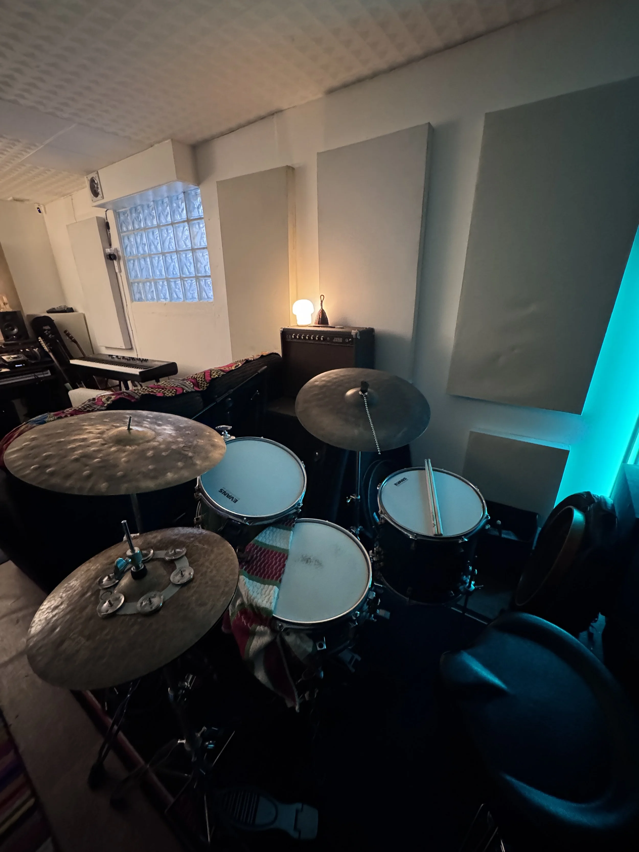 Drum and instrument setup in The Low Studios recording space.