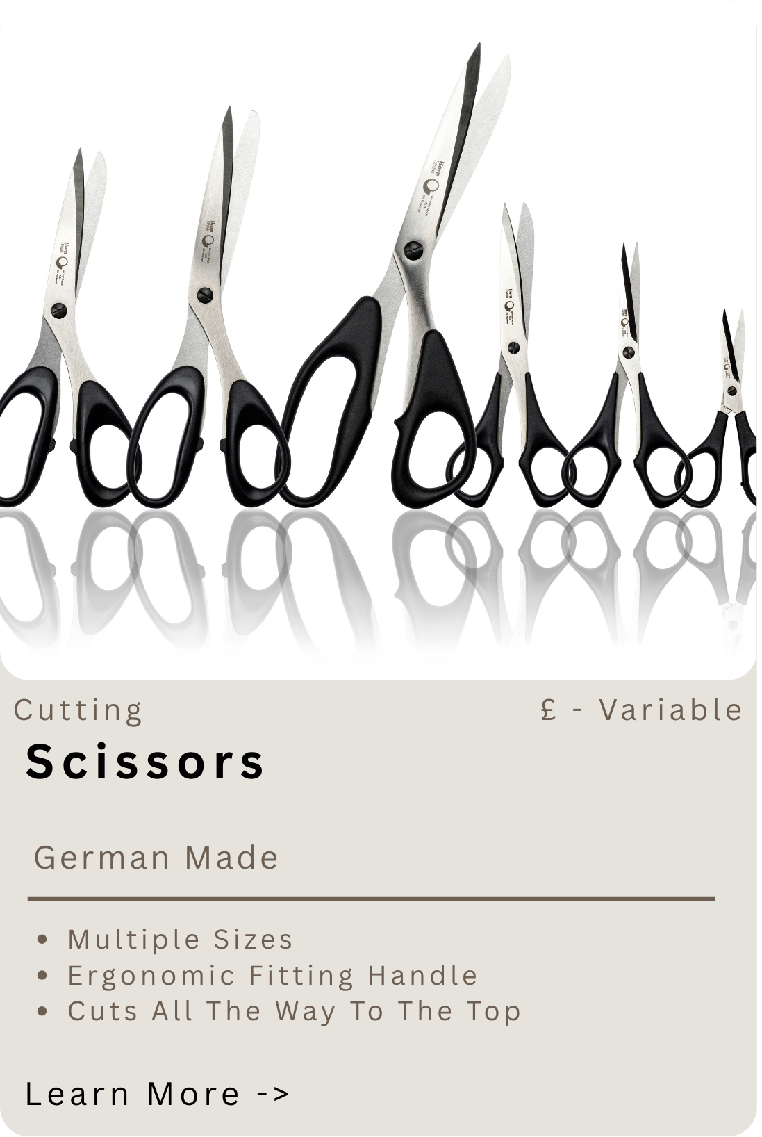 A row of various sized scissors with black handles, displayed against a white background, with a reflective surface below.