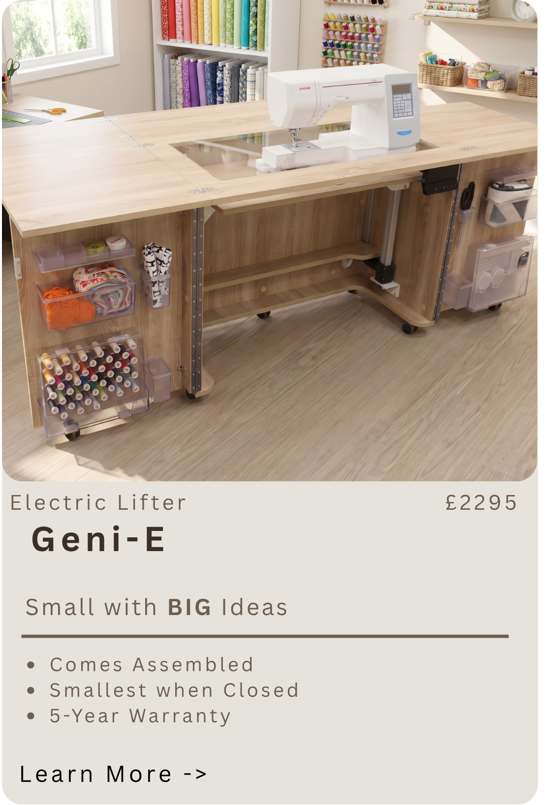 A worktable with a sewing machine, sewing supplies in clear containers attached to the side, and a large window in the background. There are shelves with colorful spools of thread and fabric rolls.