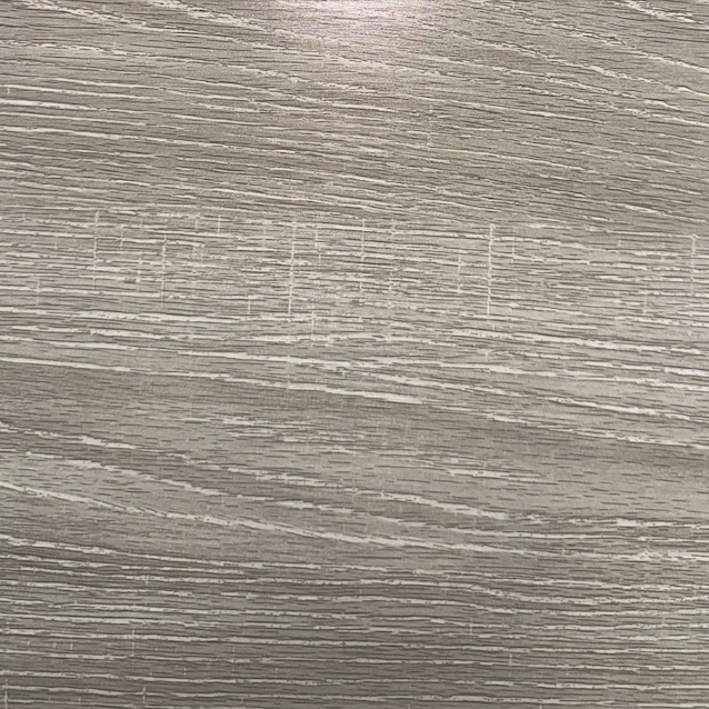 Close-up of a light wood textured surface.