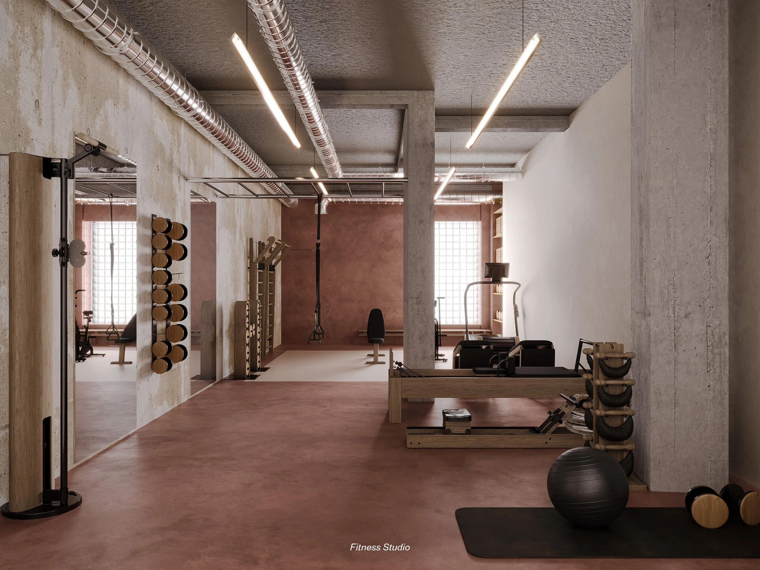 Modern fitness studio with various exercise equipment, including a stability ball, dumbbells, resistance bands, and workout machines, with natural light coming through large checkered windows and a warm, neutral color scheme