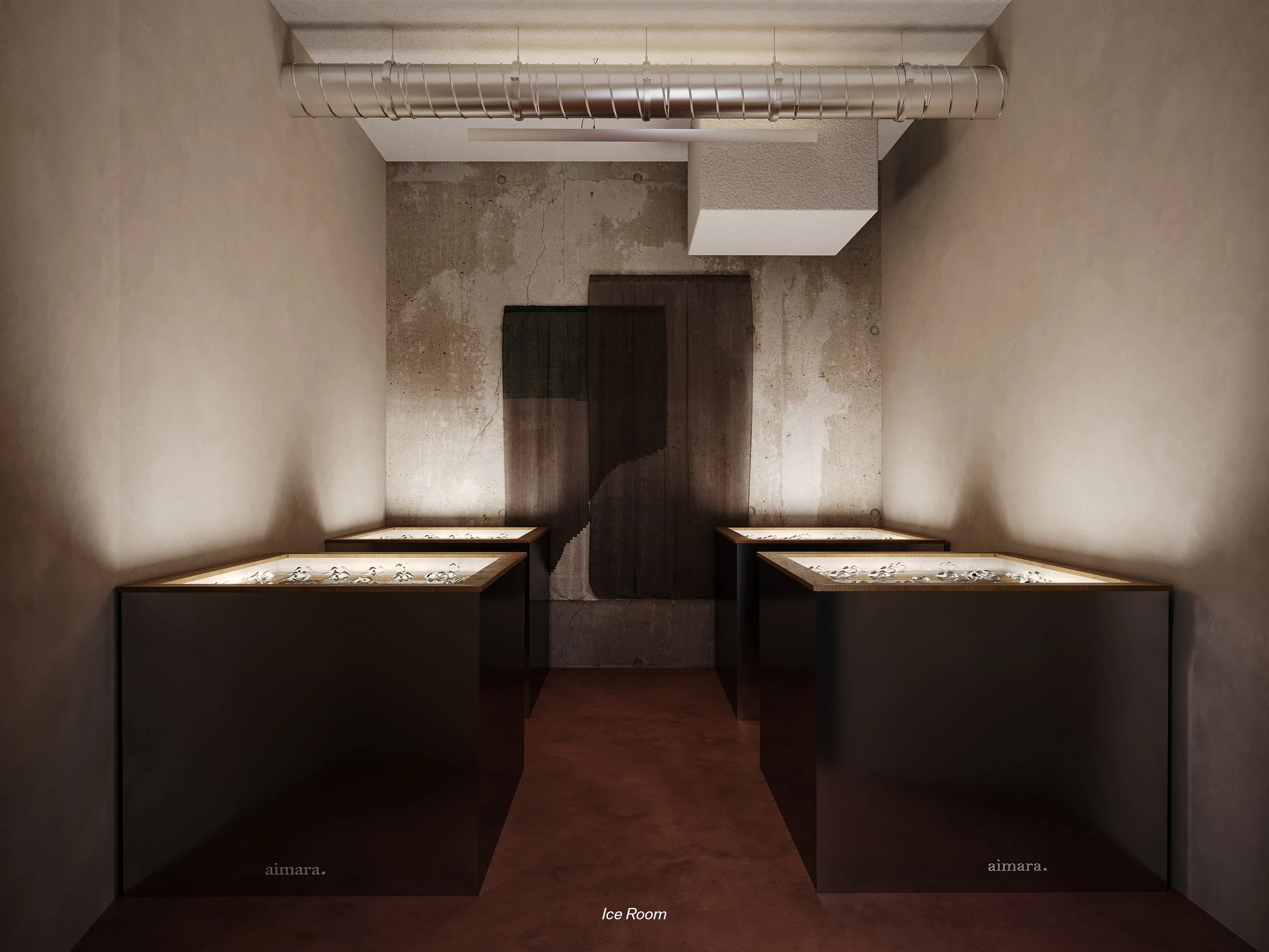 A small, minimalist ice room with four black display cases containing ice cubes, two on each side, and a textured concrete wall with dark decorative panels at the back. The room has a pipe running along the ceiling.