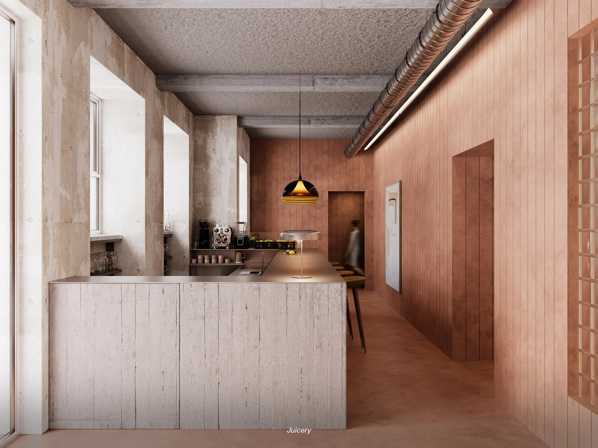 A modern, minimalist cafe or juice bar with a concrete and wood interior. There is a counter with a computer and coffee machines, and a person walking in the background.