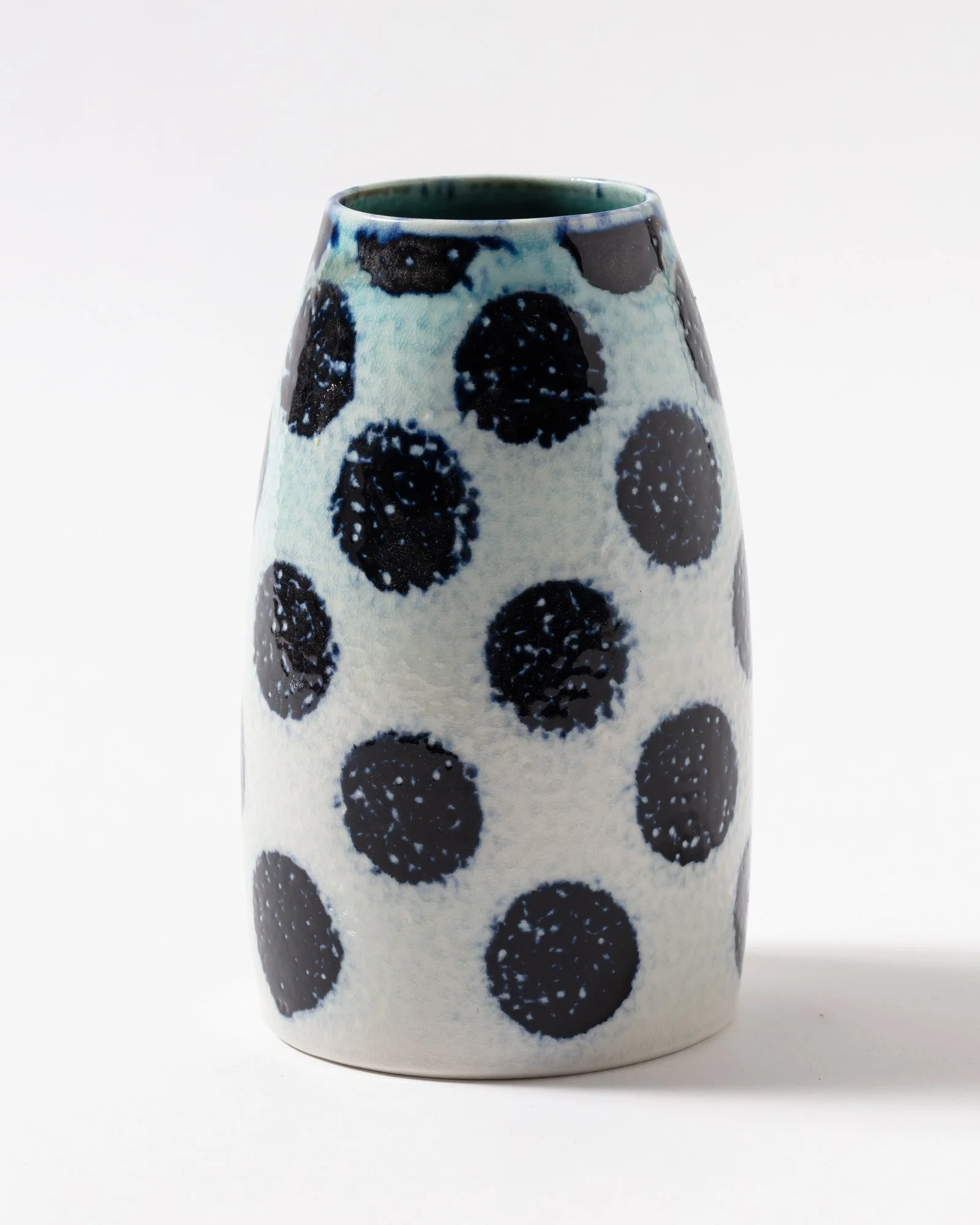 Small, Porcelain, Soda Fired Vase $95
