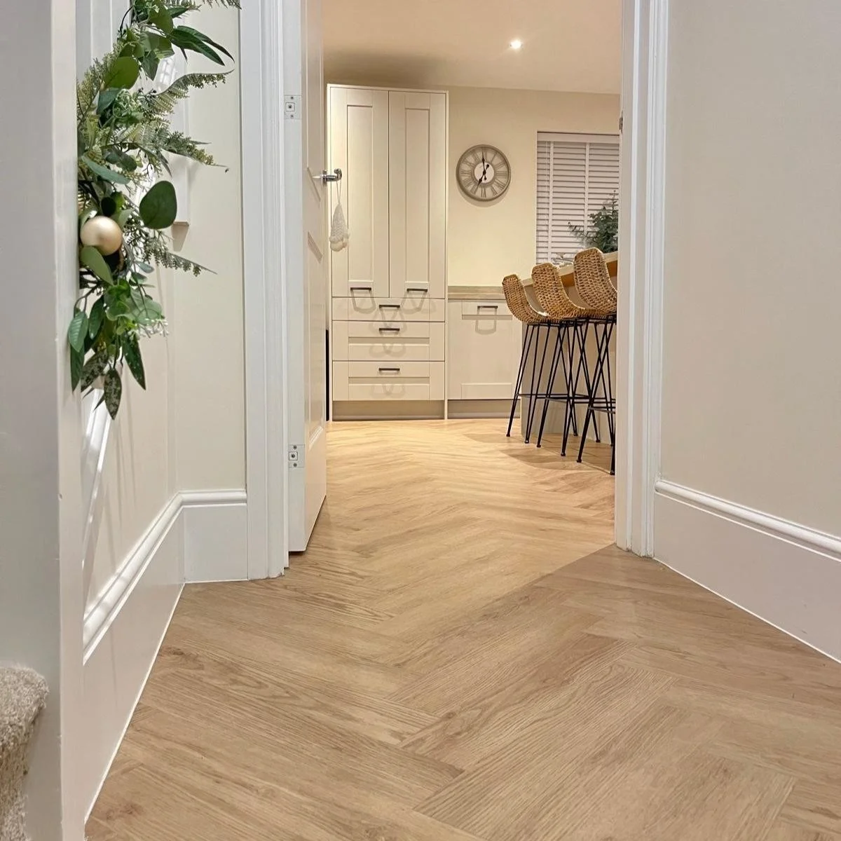 Captured here.. Our Classic Oak Beige (LVTH02) in a traditional herringbone layout to elevate the living space with warmth and texture. 
The soft oak tones pair effortlessly with a neutral palette, creating a timeless yet contemporary finish that com