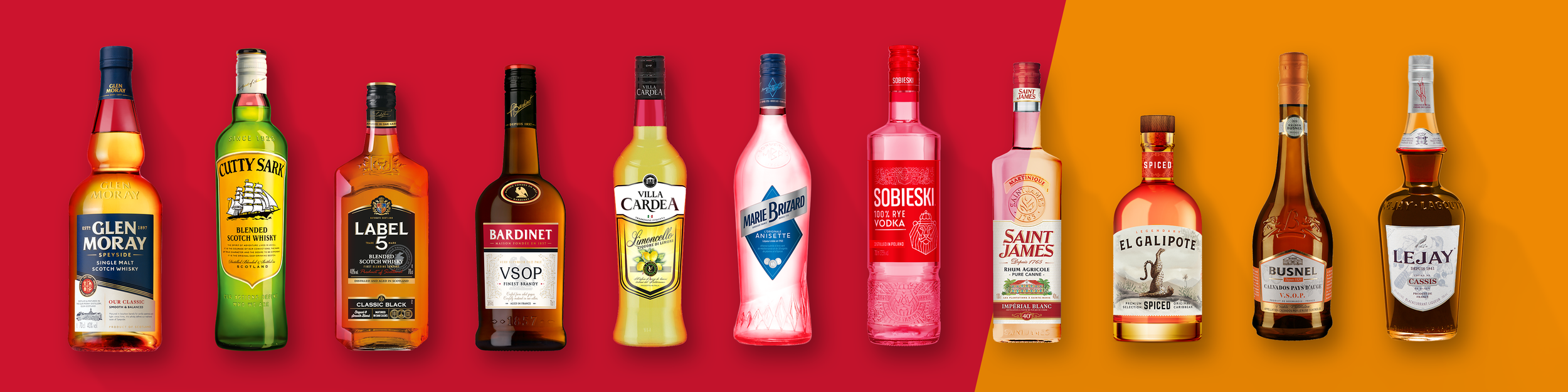 Assorted liquor bottles displayed in a row on a red and orange gradient background, featuring various types of alcoholic beverages including whisky, brandy, vodka, and liqueurs.