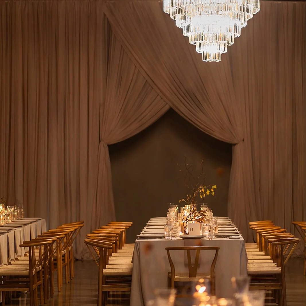 Impactful lighting and moody draping ✨

Planning and design @clementandcoevents 
Photos @coessential.wed 
Table candles and foliage @neroli_floraldesign 
Production @solepower 
Draping @eventuredesign 
Venue @thesymesca 
Rentals @detailzfurniturerent