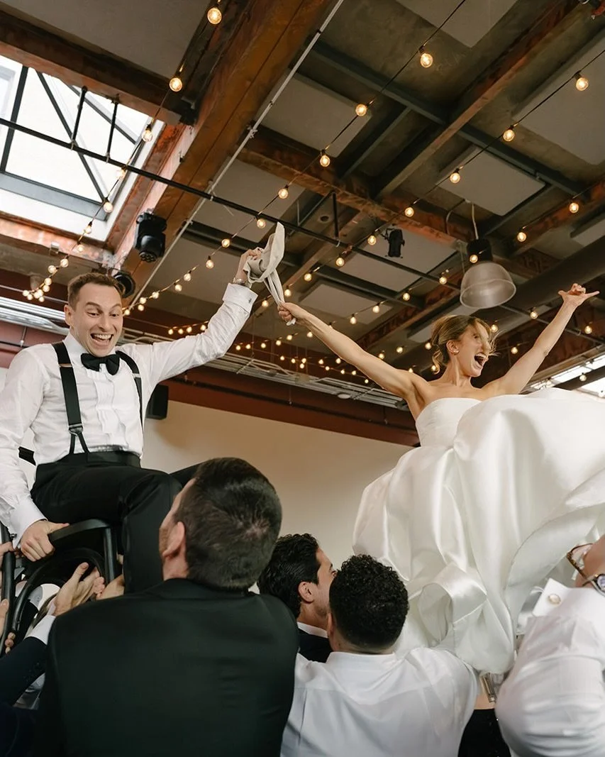 Nothing beats the pure joy of a good Hora 🫶🏻

Planning and design @clementandcoevents 
Photos @liza_lit 
Florist @huntandgatherfloral 
Venue @thesymesca 
Production @solepower 

#weddingday #hora #weddinginspiration #weddingphotography