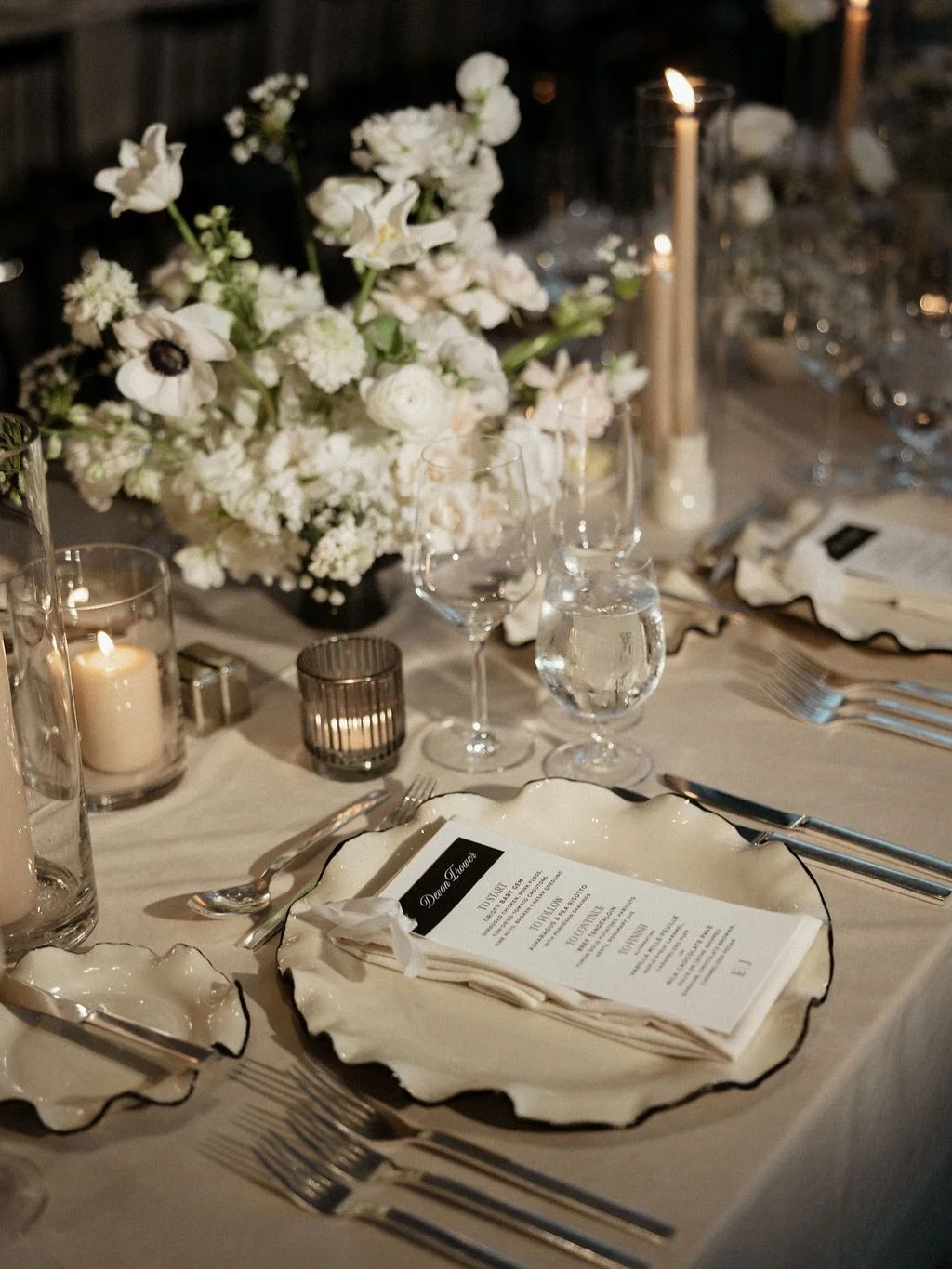 For E &amp; J 🤍🤍🤍

Planning and design @clementandcoevents 
Photos @chelsea.gurr 
Stationery @paperandposte 
Florist @fablefloraldesign 
Venue @fstoronto 
Chargers @tabletalesinc 
Draping @eventuredesign 

#fourseasonshotel #blackandwhitewedding #