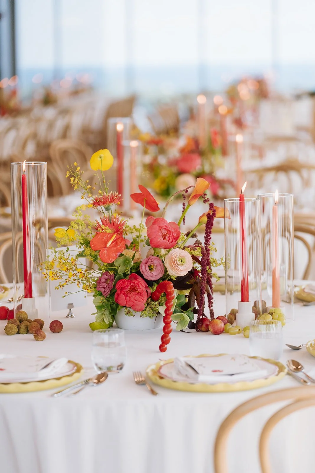 clement-and-co-globe-and-mail-centre-red-flowers-table.jpg