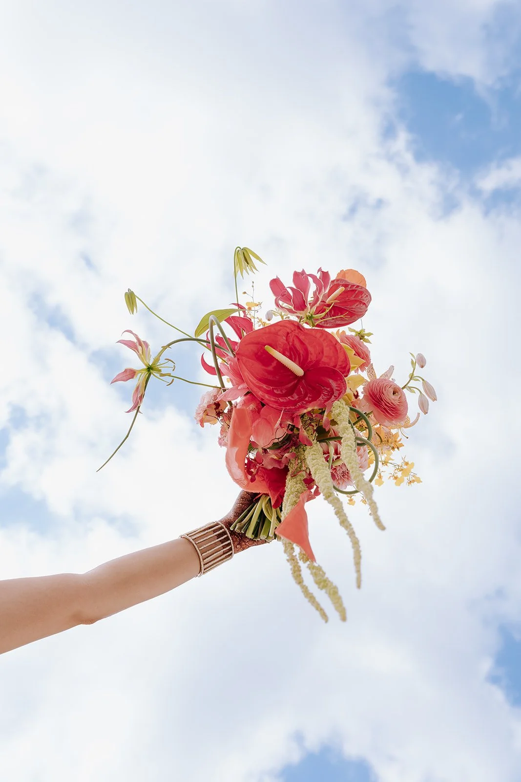 clement-and-co-globe-and-mail-centre-red-orange-bouquet.jpg