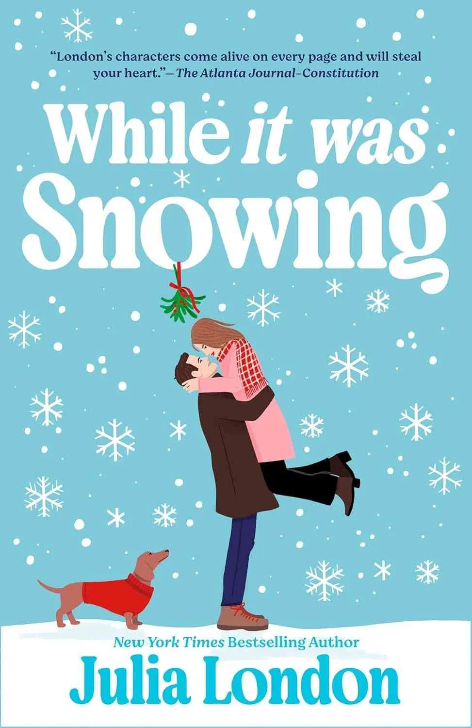 Cover of the book While it was Snowing by Julia London
