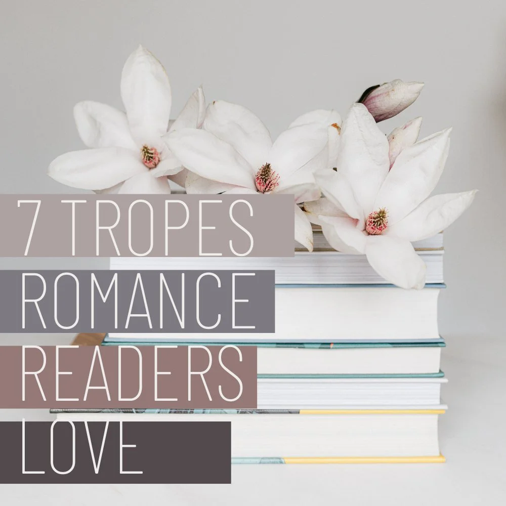 stack of romance novels with popular tropes including enemies to lovers and slow burn
