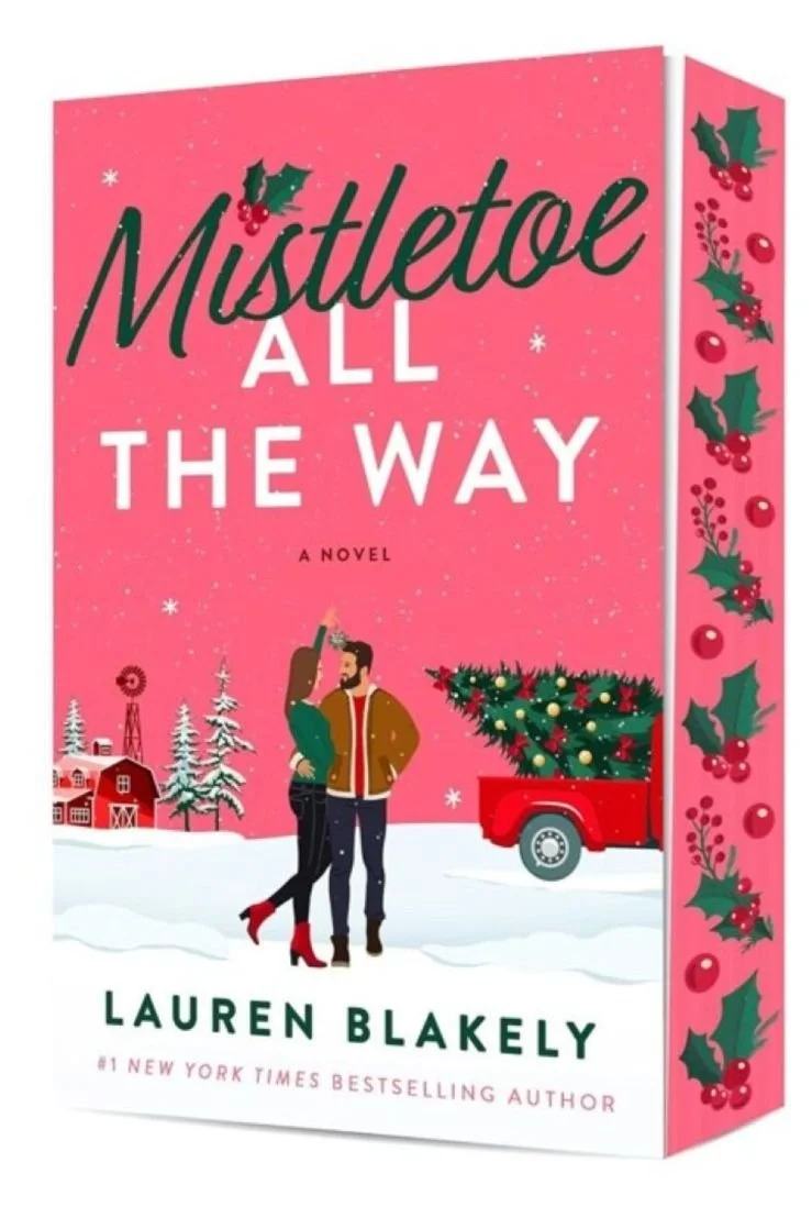 Deluxe paperback edition of the 2026 holiday romance Mistletoe All the Way by Lauren Blakely