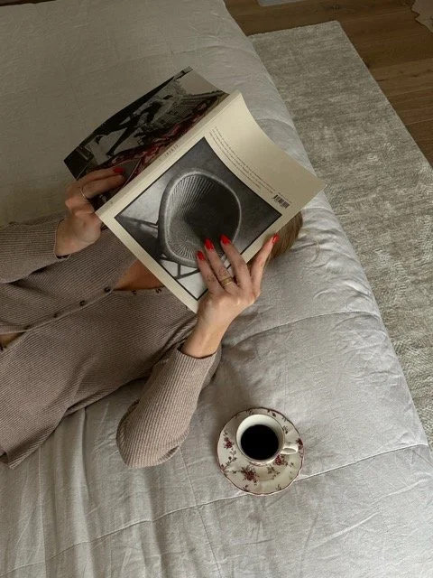 magazines-on-table-with-crystals-and-sage