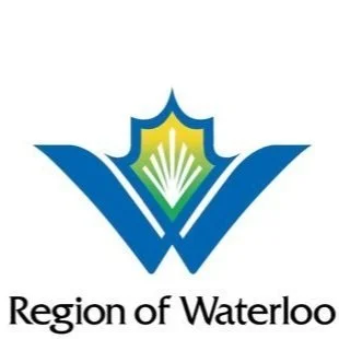 Logo featuring blue wings, a green and blue maple leaf with a white open book in the center, and the text 'Region of Waterloo' beneath.