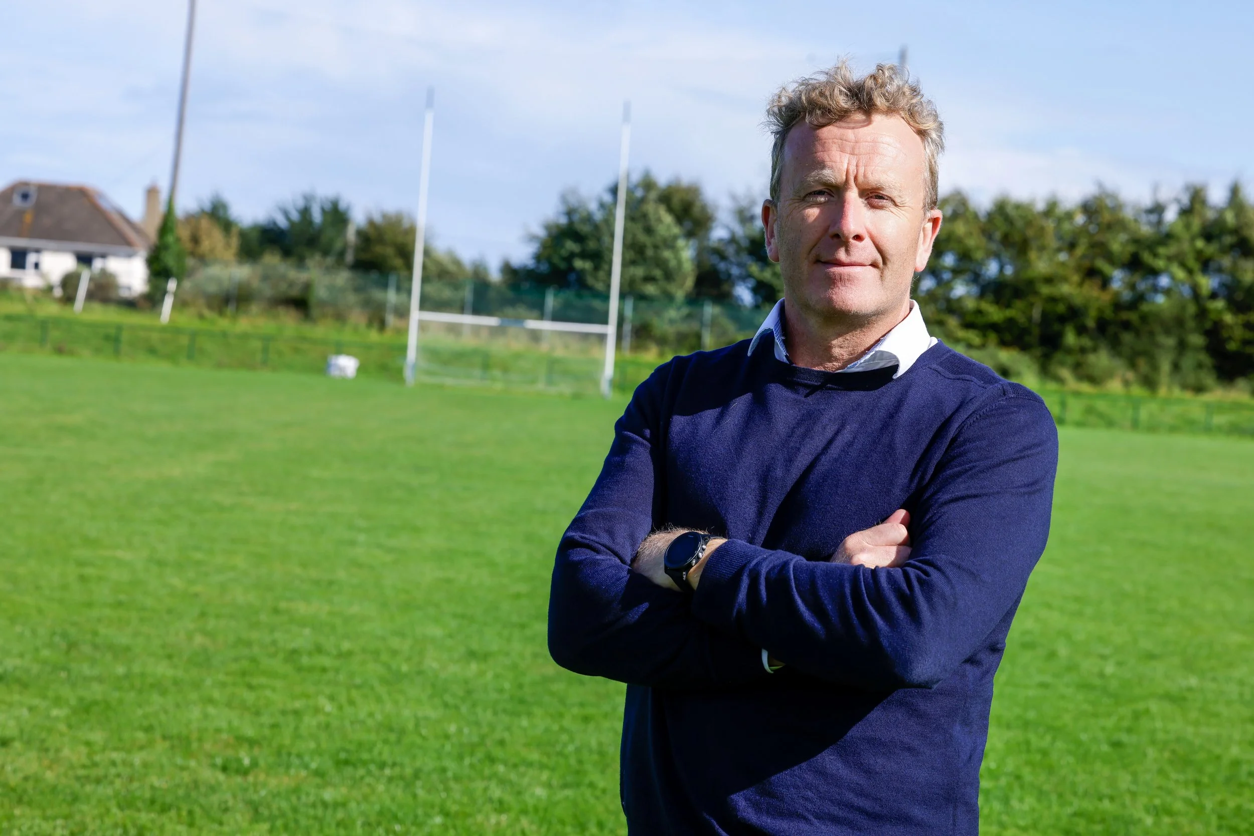 Mark Barry local Greystones Delgany Kilcoole Newcastle Wicklow Social Democrat councillor on GAA hurling pitch field.