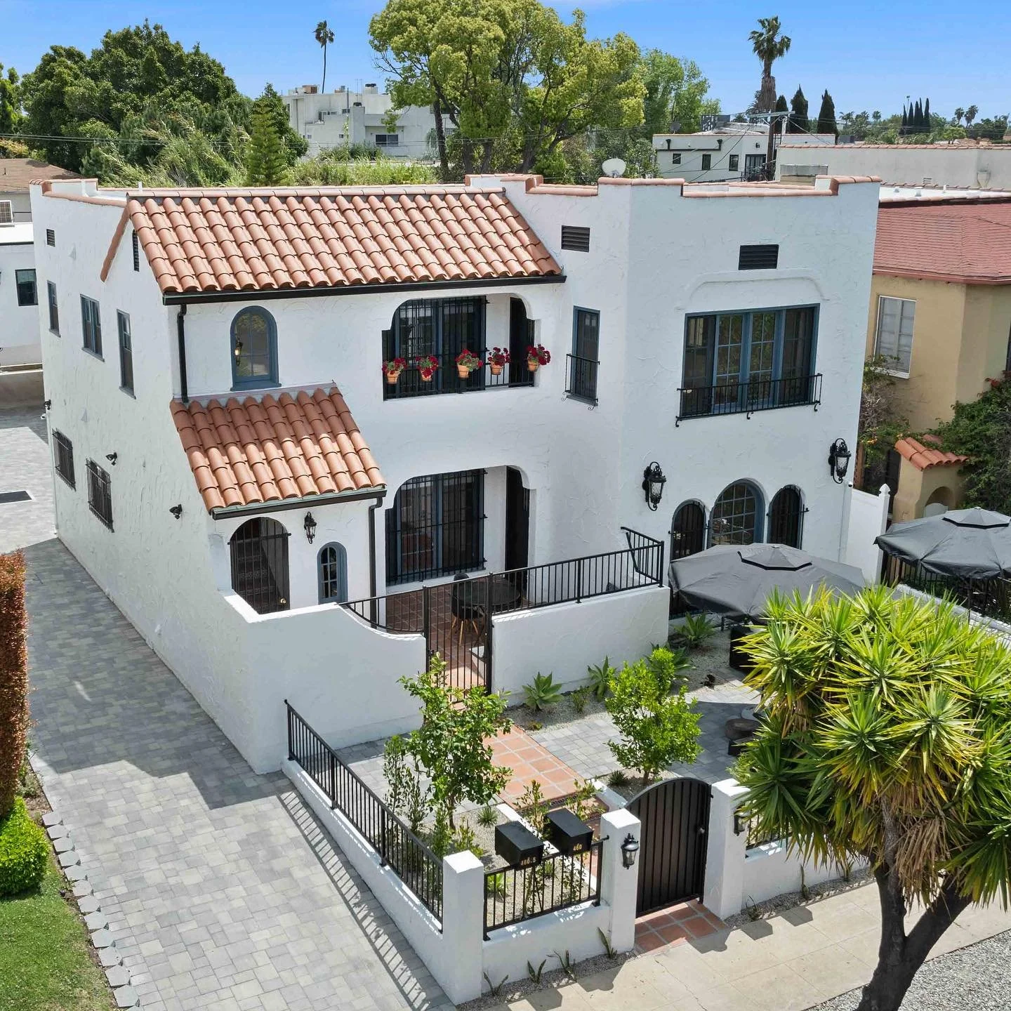 Sierra Bonita Compound is a private, design-forward retreat blending 1920s Spanish Revival charm with sleek, modern living. Featuring four fully independent 2-bed, 2-bath residences, each unit showcases custom cabinetry, curated lighting, and natural