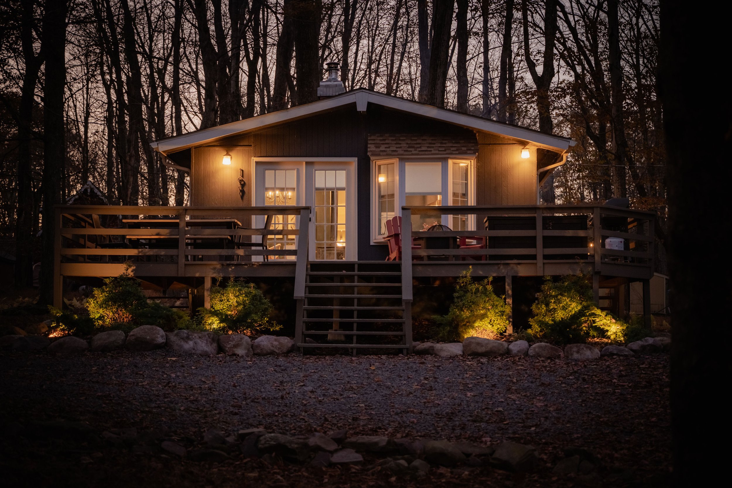 The cottage all lit up at night so guests will not have any issues finding it.