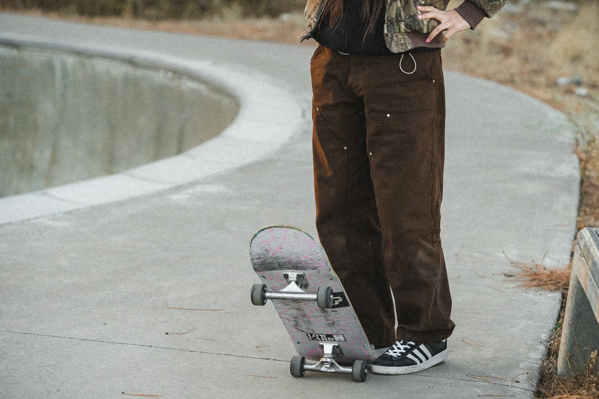 All pants were designed with unisex grading. Here is a 5'2" woman wearing size XS Double Knee Jeans.