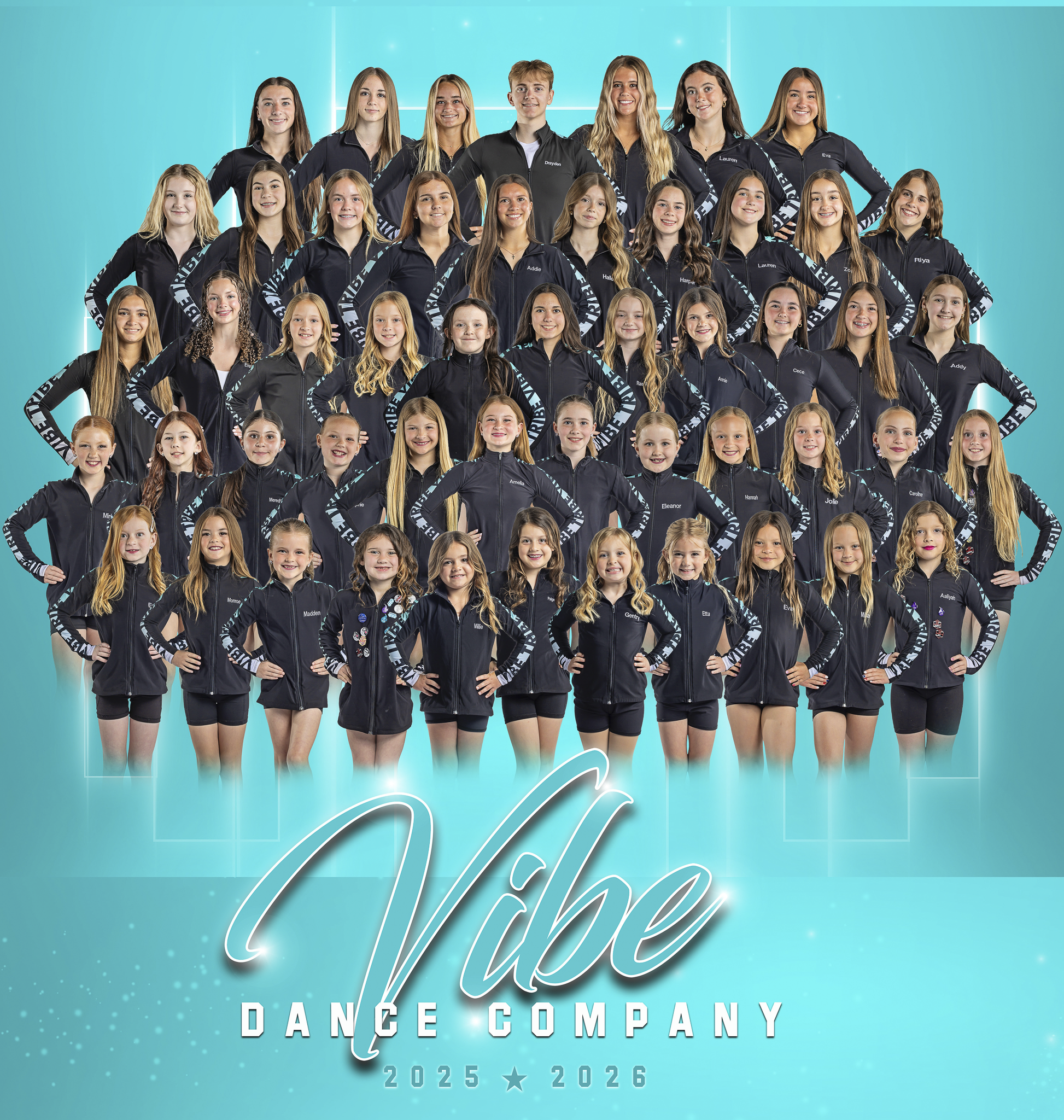 Group of dancers in matching black jackets with blue accents, standing on a stage with a blue backdrop. They are from the Rise Dance Company, with some members' names visible on their jackets. The dancers are smiling and posing for a group photo.