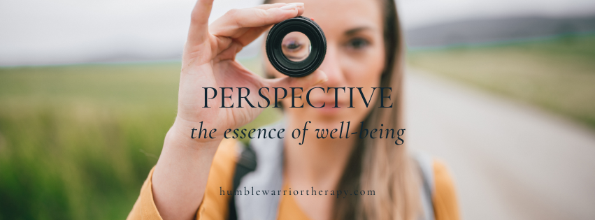 woman looking toward sunrise symbolizing perspective, clarity, and emotional resilience