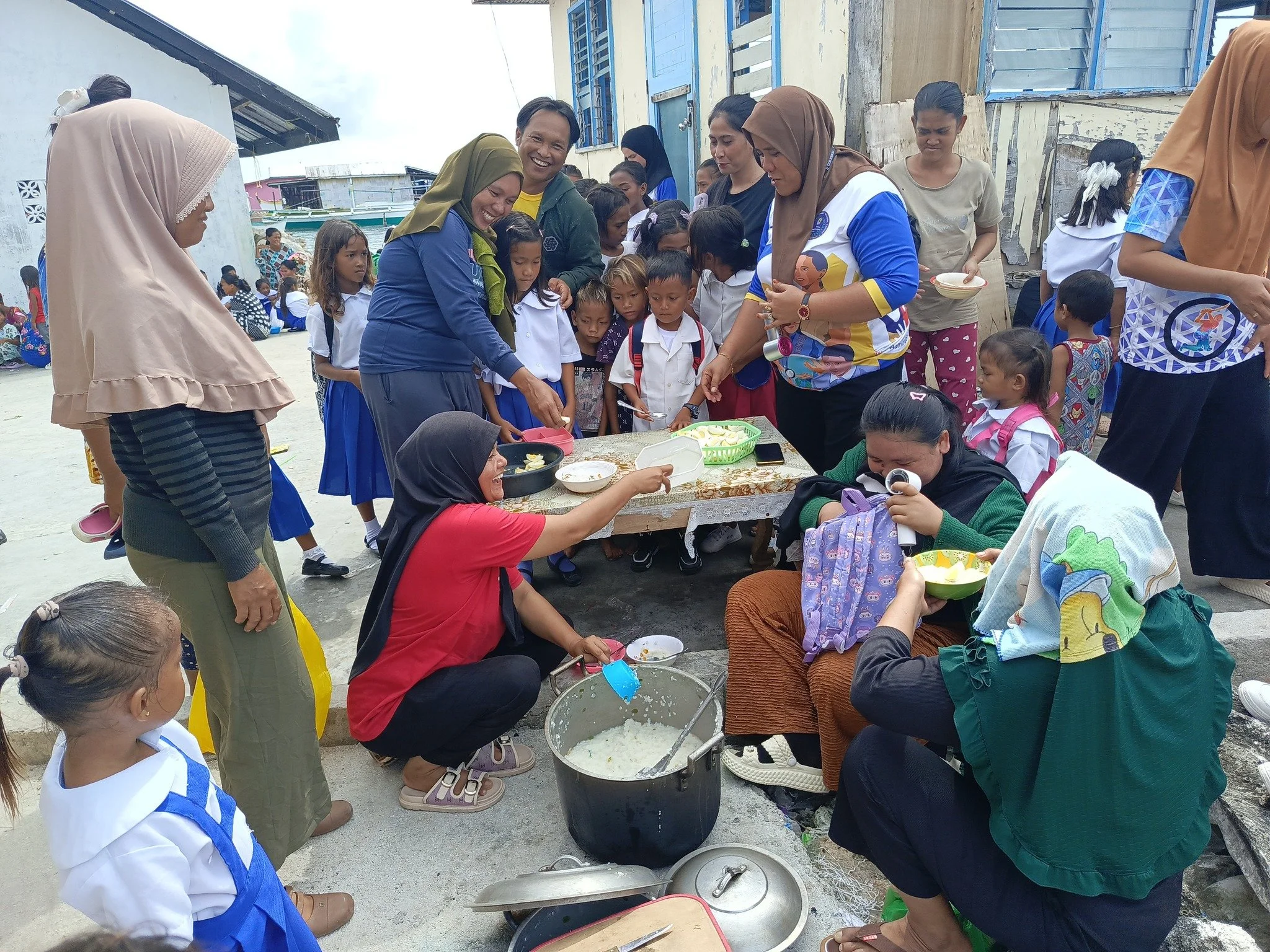 Kabukan ES 7-14-25 Mothers Serving Lunch Pic (4).jpg