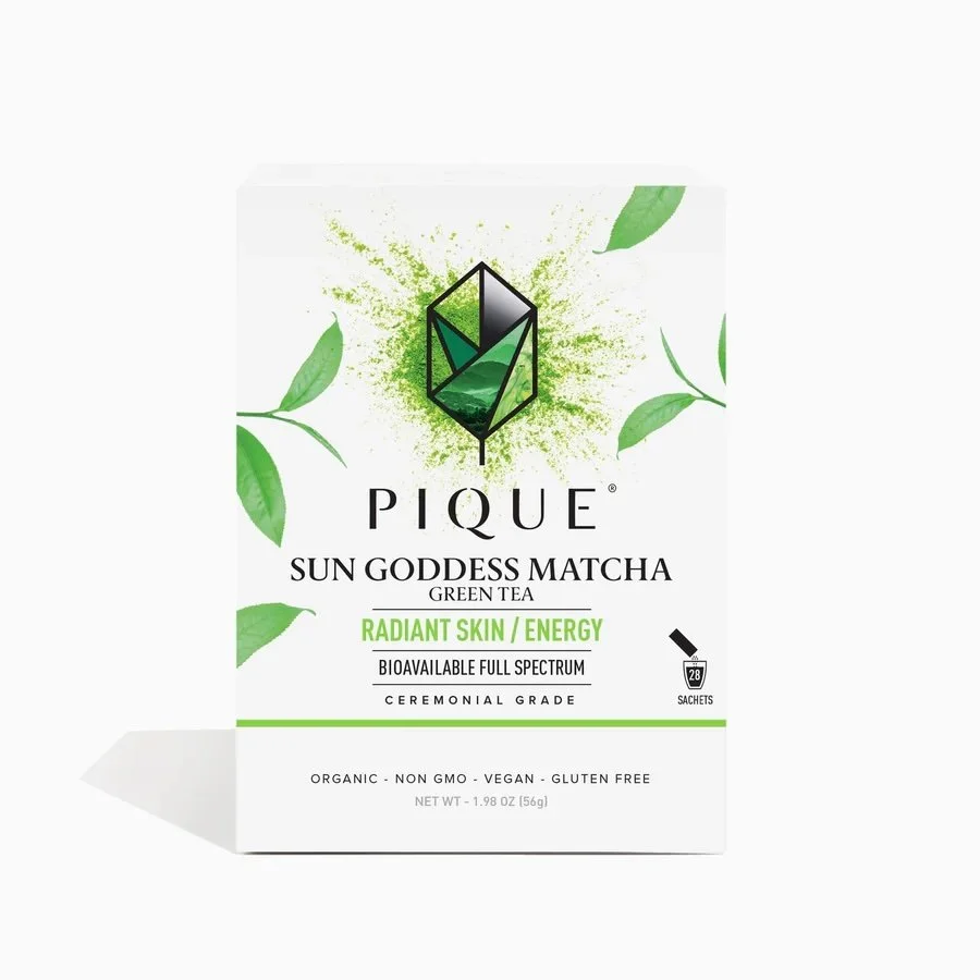 Box of Pique Sun Goddess Matcha Green Tea with illustrations of green leaves and a green splash background, stating it promotes radiant skin and energy, is organic, non-GMO, vegan, gluten-free, and contains 28 sachets.