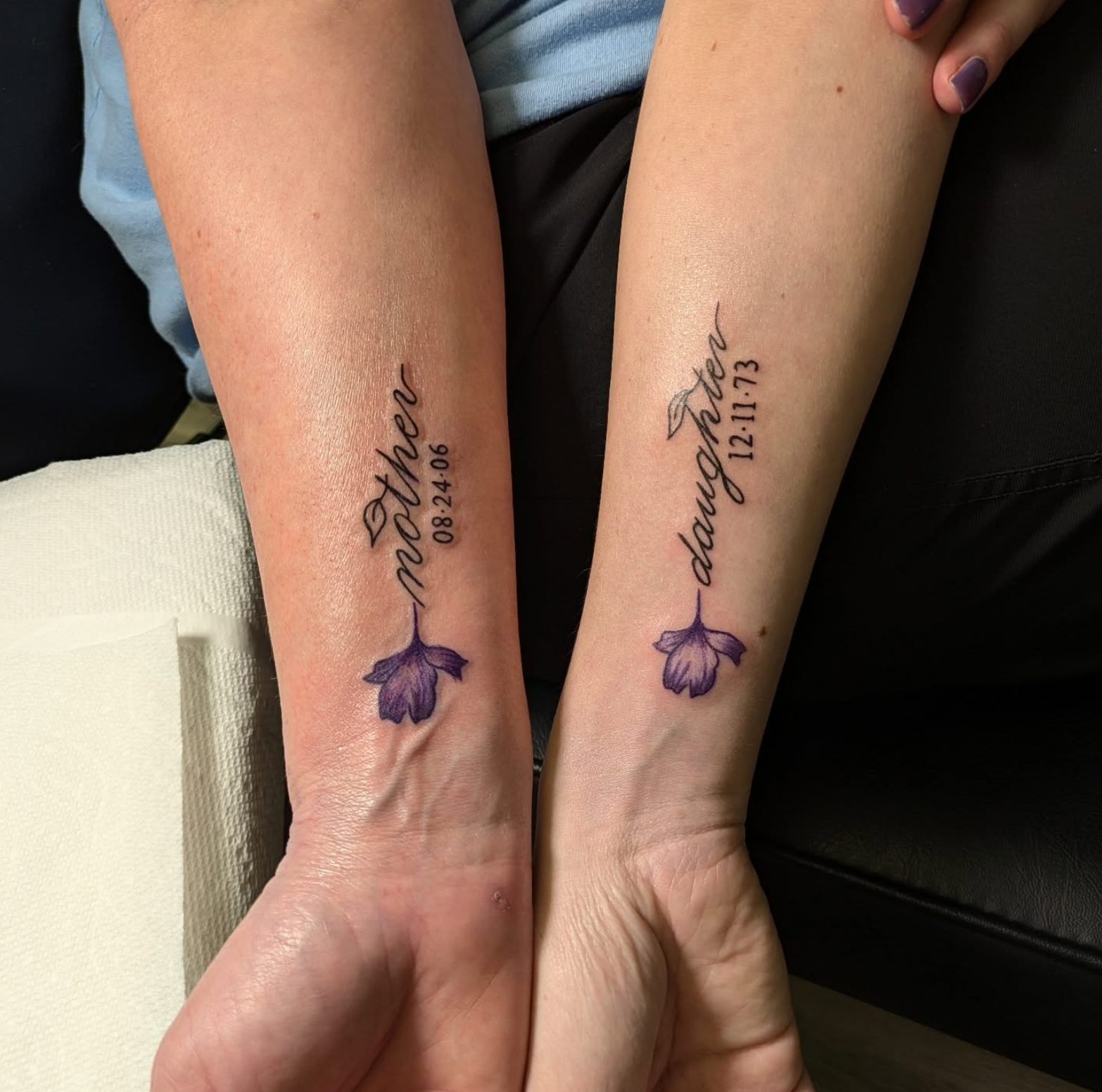 Script Mother Daughter tattoo by tattoo artist Willow Thomason located in Wolfville, Nova Scotia