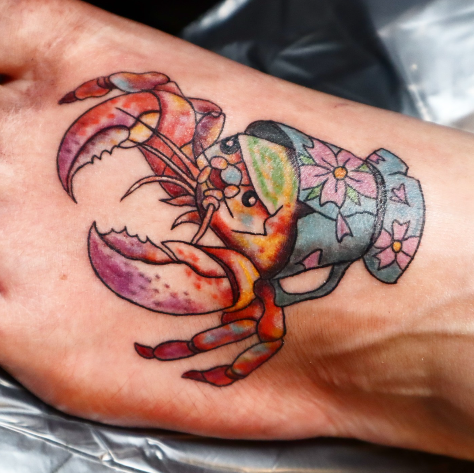 Teacup Crab tattoo by tattoo artist Willow Thomason located in Wolfville, Nova Scotia