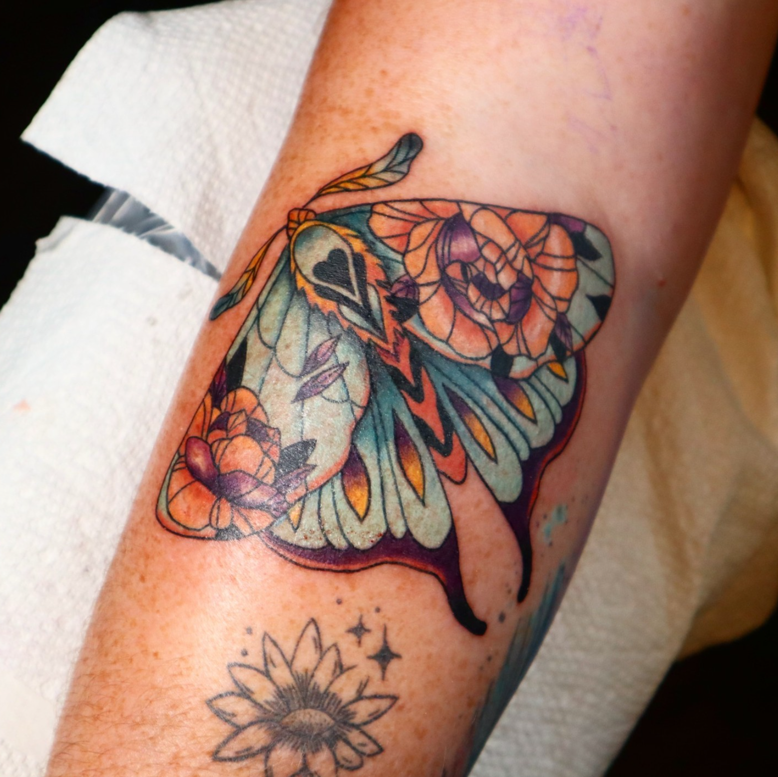 Lunar Moth tattoo by tattoo artist Willow Thomason located in Wolfville, Nova Scotia