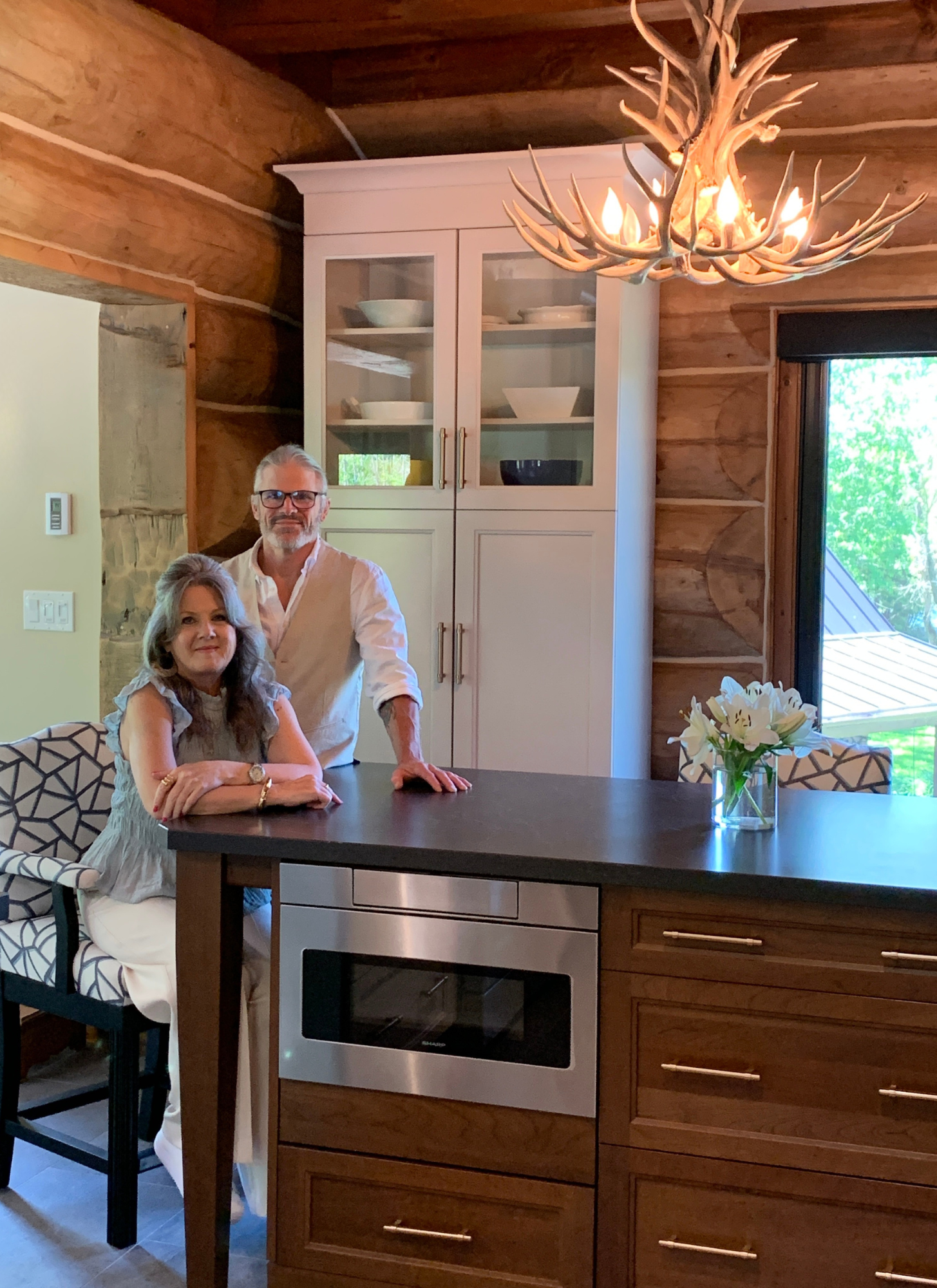 Todd and Sandra from Hardrock Home on site at a log home kitchen renovation in York Region